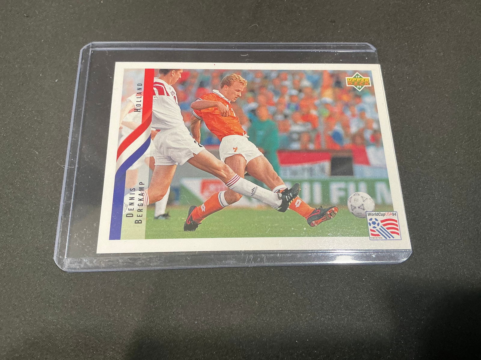 Dennis Bergkamp 1994 Upper Deck World Cup USA Soccer Card Holland: 1994 Upper Deck World Cup USA soccer card featuring Netherlands star Dennis Bergkamp. Classic World Cup USA issue with action photography. Housed in a protective holder and ideal for World Cup and int