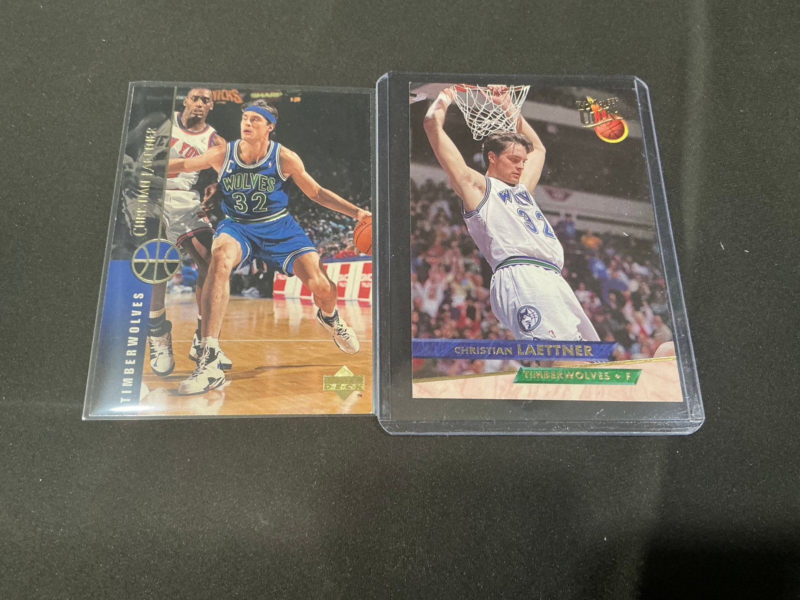 Two Christian Laettner Minnesota Timberwolves Basketball Cards: Pair of Christian Laettner Minnesota Timberwolves basketball cards. Includes premium issues with strong action photography. Clean examples housed in protective holders.