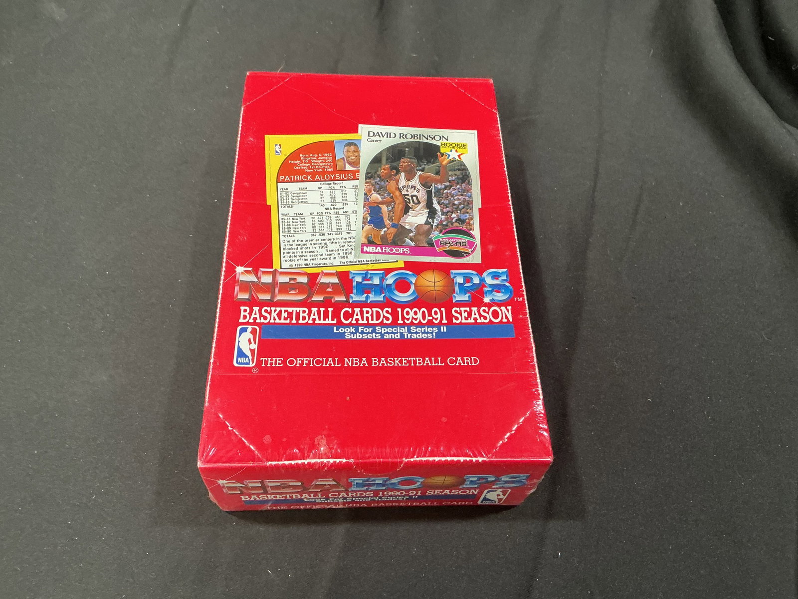 1990-91 NBA Hoops Basketball Cards Factory Sealed Wax Box: Factory sealed 1990-91 NBA Hoops basketball trading card wax box. Classic early-1990s NBA release featuring stars of the era including Michael Jordan, Larry Bird, Magic Johnson, and David Robinson.