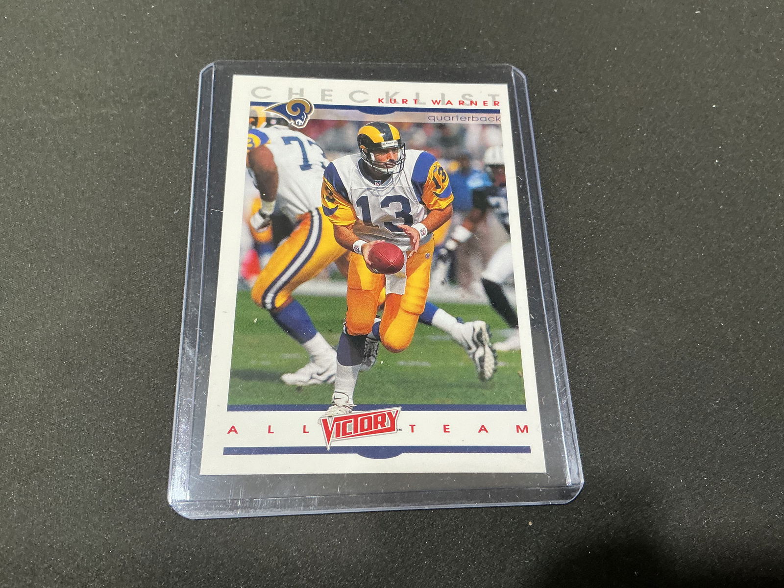 2000 Upper Deck Victory Kurt Warner All Victory Team Football Card: 2000 Upper Deck Victory football trading card featuring Kurt Warner, quarterback of the St. Louis Rams. Issued shortly after Warner's MVP season and Super Bowl XXXIV victory with the Rams. Card