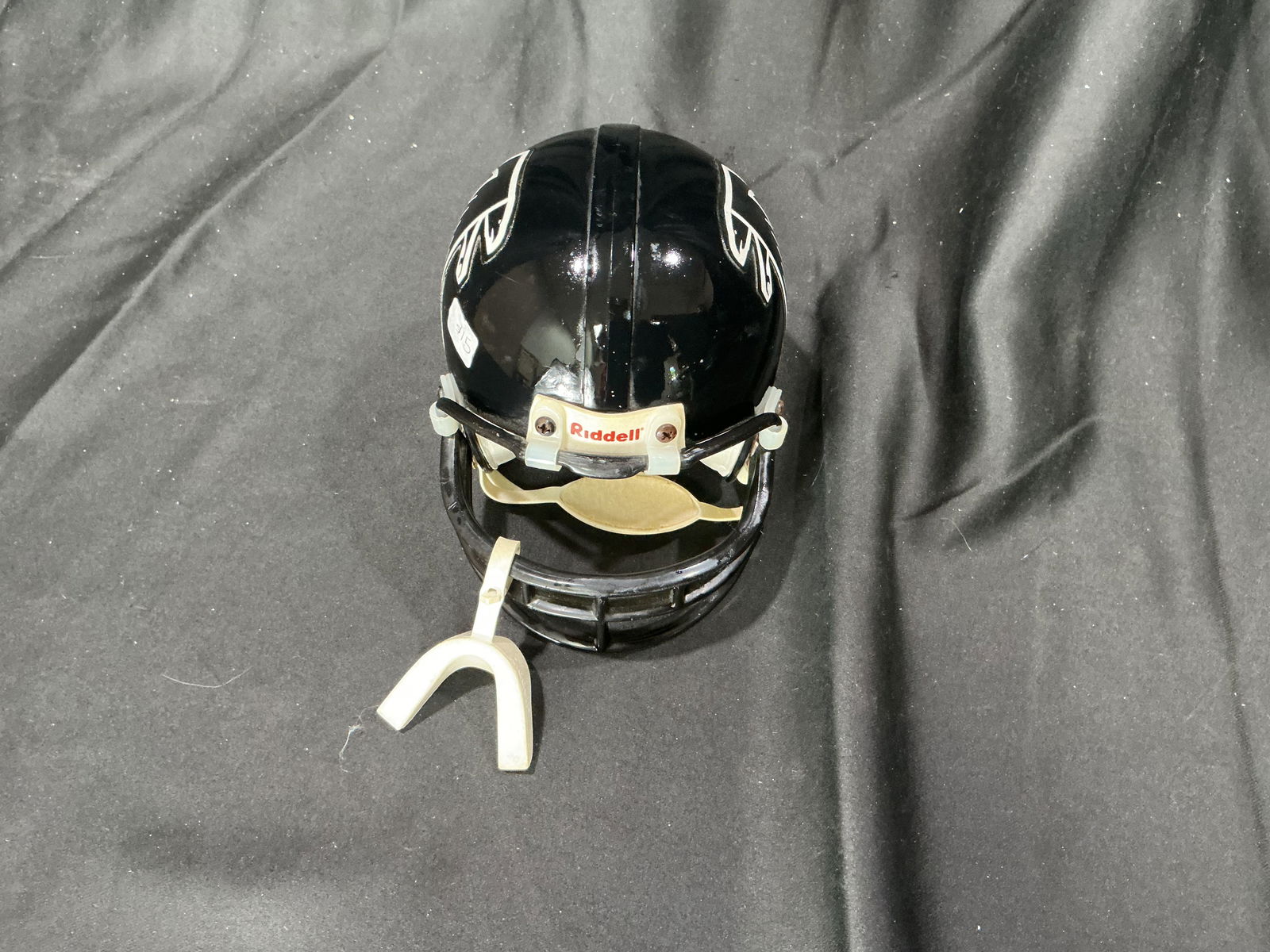 Atlanta Falcons Mini Riddell Helmet: Atlanta Falcons mini display helmet by Riddell featuring team logo and original factory tags.