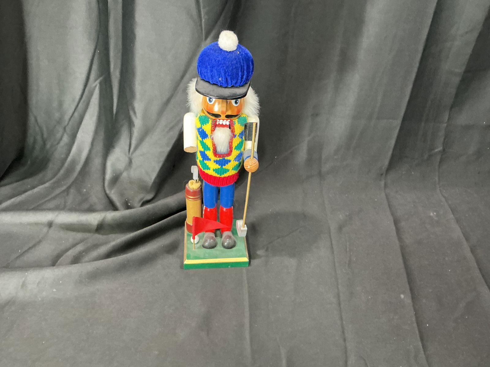 German-style wooden nutcracker figure with ski accessories (1 of 3)