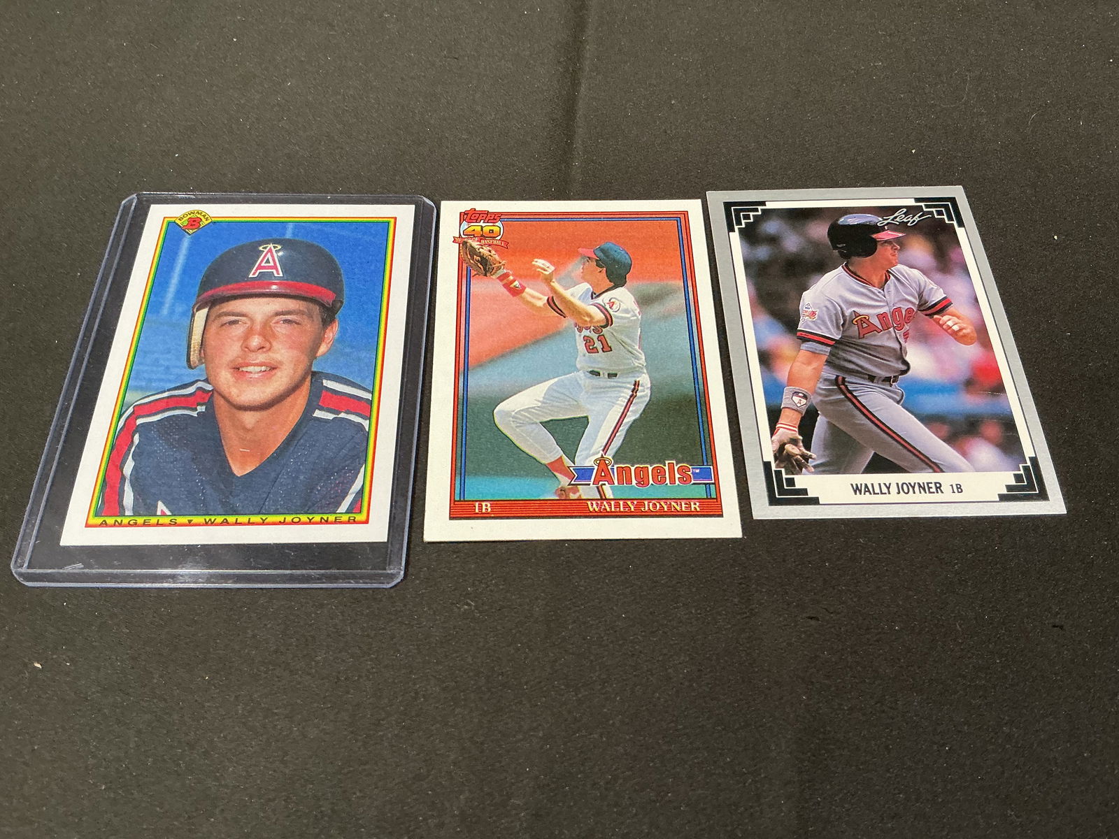 Wally Joyner California Angels Baseball Card Lot 3 Cards Topps Bowman Leaf: Group of three vintage Wally Joyner baseball cards featuring the California Angels, including Topps, Bowman, and Leaf issues. Popular late 1980s and early 1990s player lot with multiple designs and ca