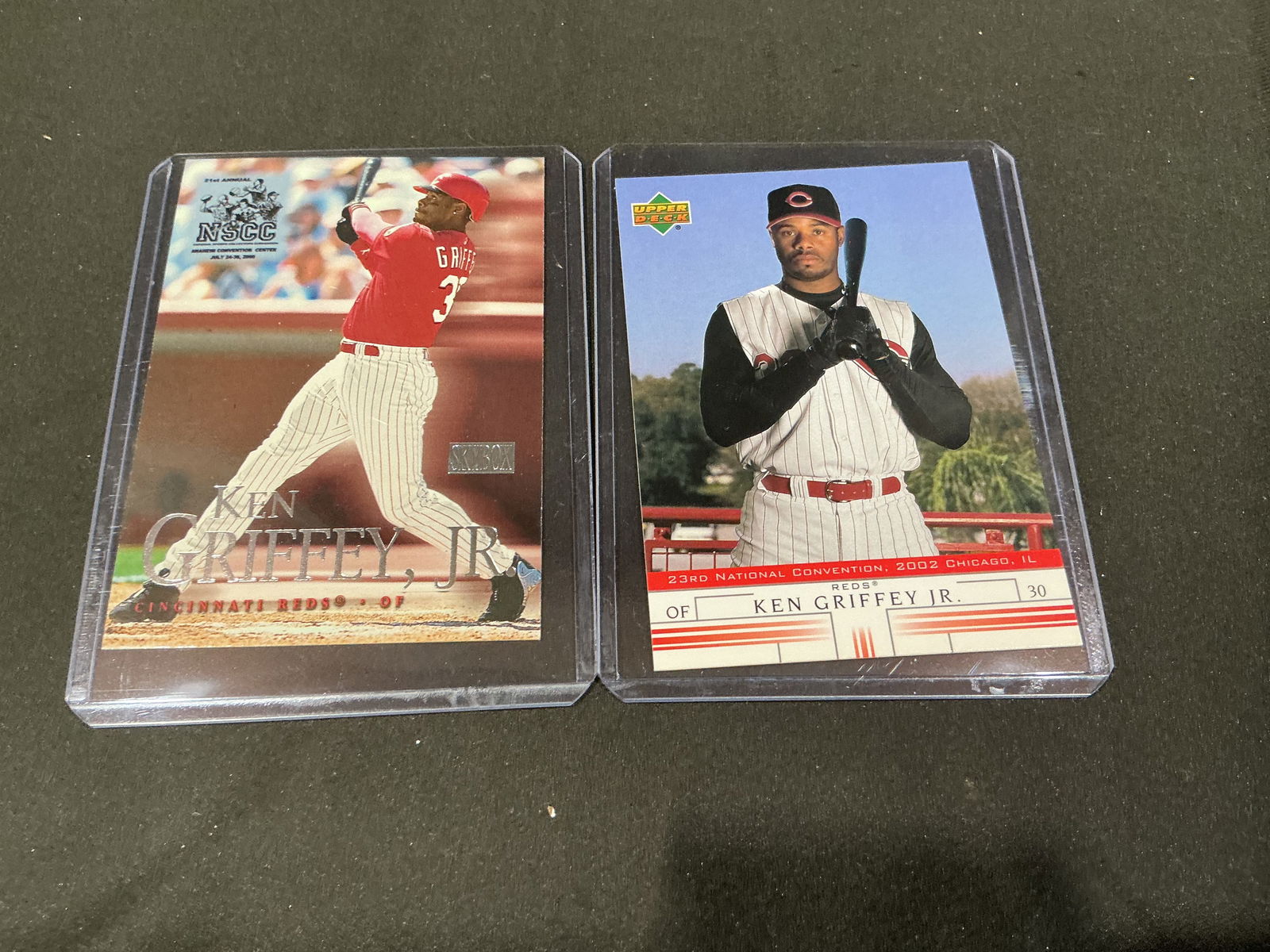 Ken Griffey Jr Cincinnati Reds Baseball Card Lot 2 Cards Upper Deck NSCC: Group of two Ken Griffey Jr baseball cards featuring his Cincinnati Reds era. Includes Upper Deck and NSCC convention issue card. Hall of Fame outfielder and one of the most iconic players of the mode