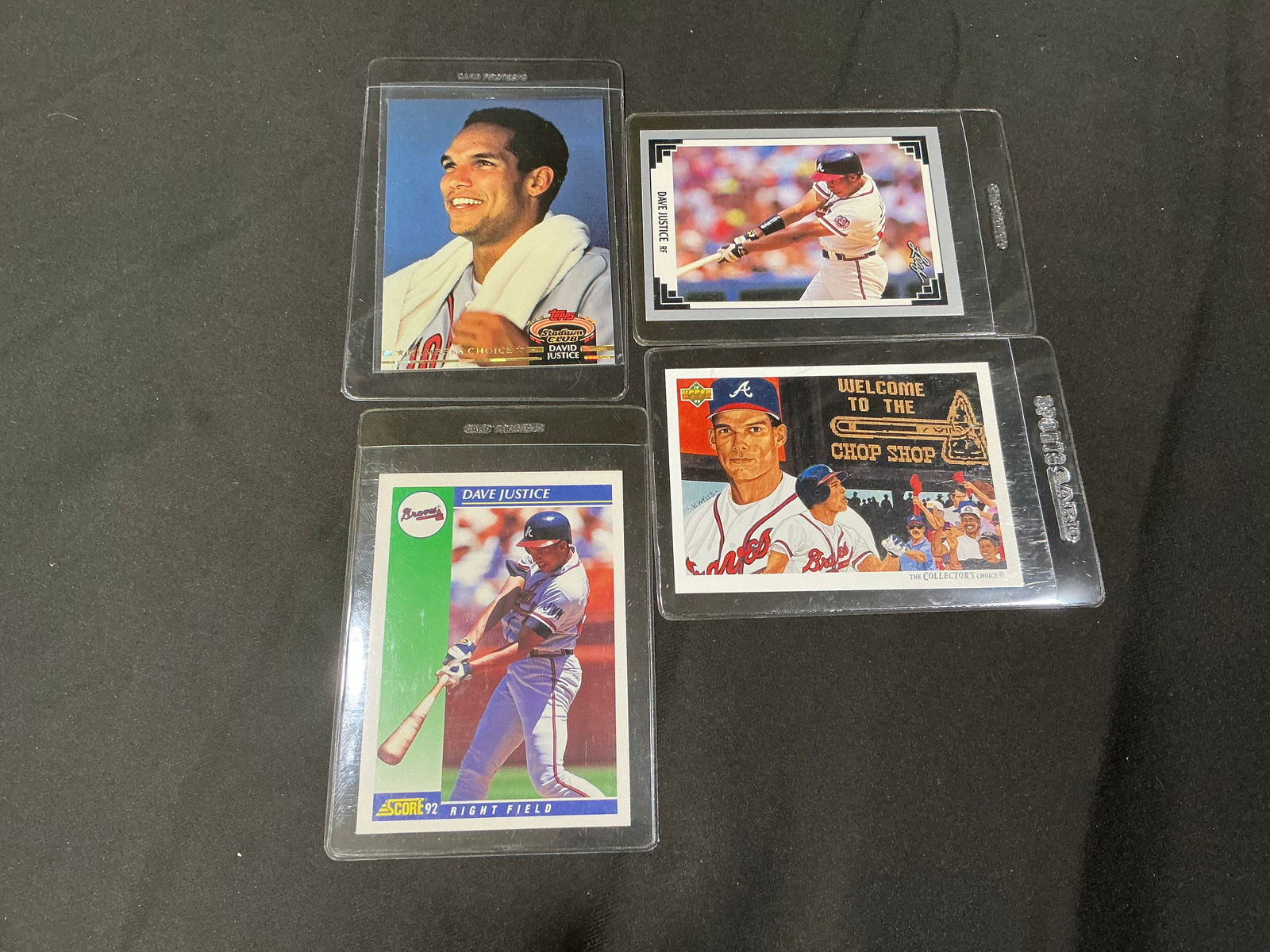 David Justice Atlanta Braves Baseball Card Lot 4 Cards Topps Score Upper Deck: Group of four David Justice baseball cards featuring the Atlanta Braves World Series champion outfielder. Includes issues from Topps, Score, and Upper Deck highlighting Justice during his strong early