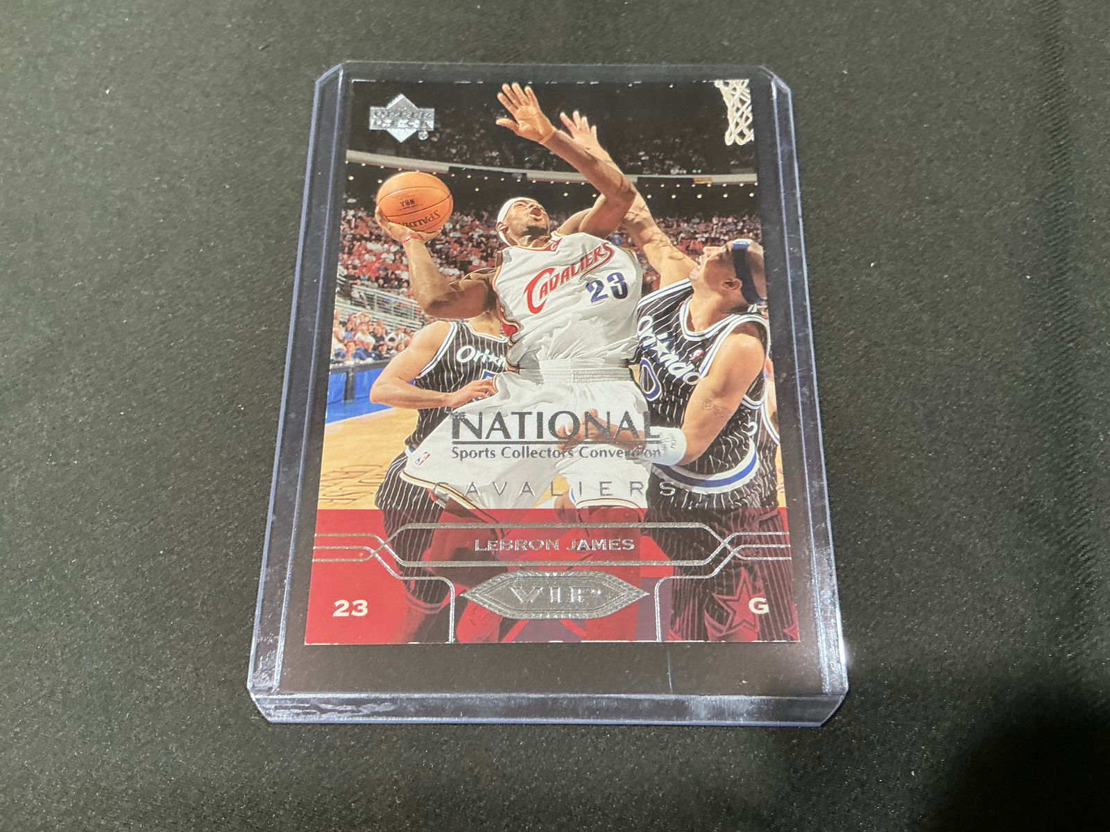 LeBron James Cleveland Cavaliers 2004 Upper Deck National VIP Rookie Era Card: LeBron James Upper Deck 'The National' VIP card featuring the Cleveland Cavaliers superstar during his early NBA career. Issued around the 2004 National Sports Collectors Convention and highlights LeB