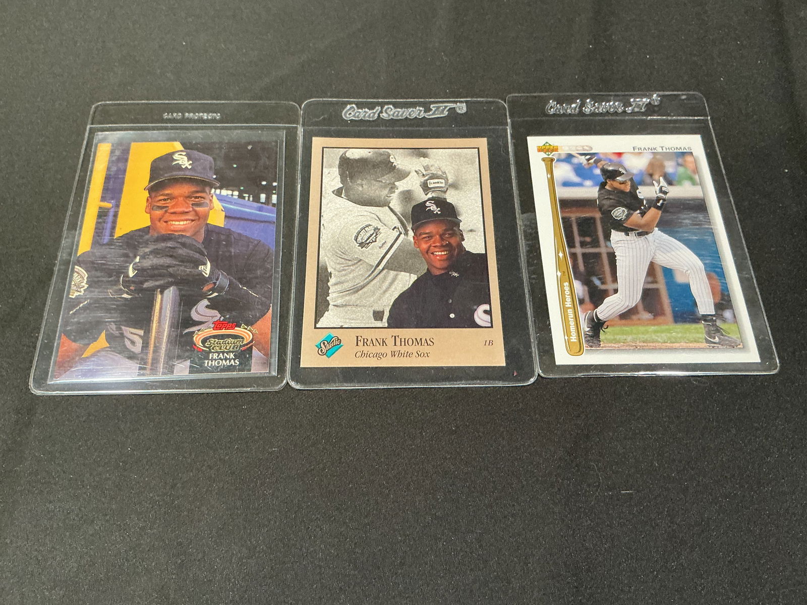 Frank Thomas Baseball Card Group of 3 Chicago White Sox Mixed Issues: Group of three Frank Thomas baseball cards featuring Chicago White Sox issues including Topps Stadium Club, Studio, and Upper Deck releases. Showcases Thomas during his dominant career as one of the p