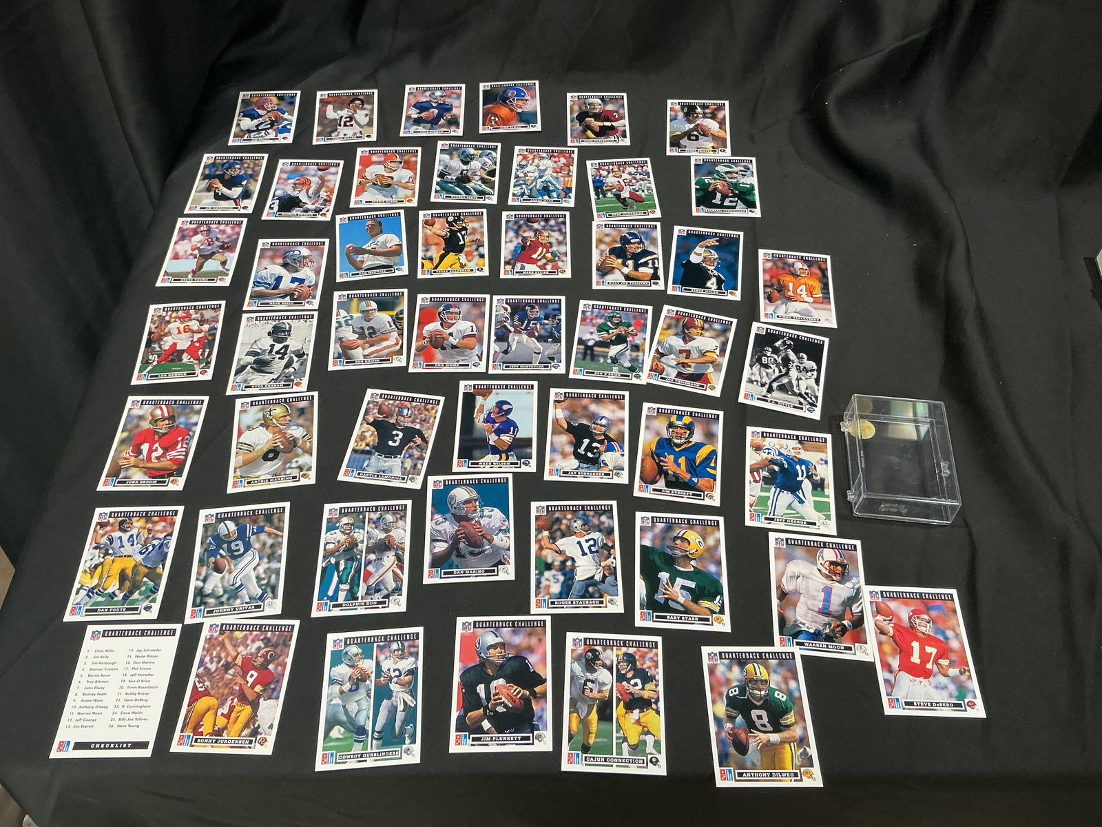 1990 Pro Set NFL Quarterback Challenge Card Lot Large Group w/ Stars: Large group of 1990 Pro Set NFL Quarterback Challenge football cards featuring a wide range of quarterbacks and star players. Includes multiple notable names across teams along with checklist cards. A