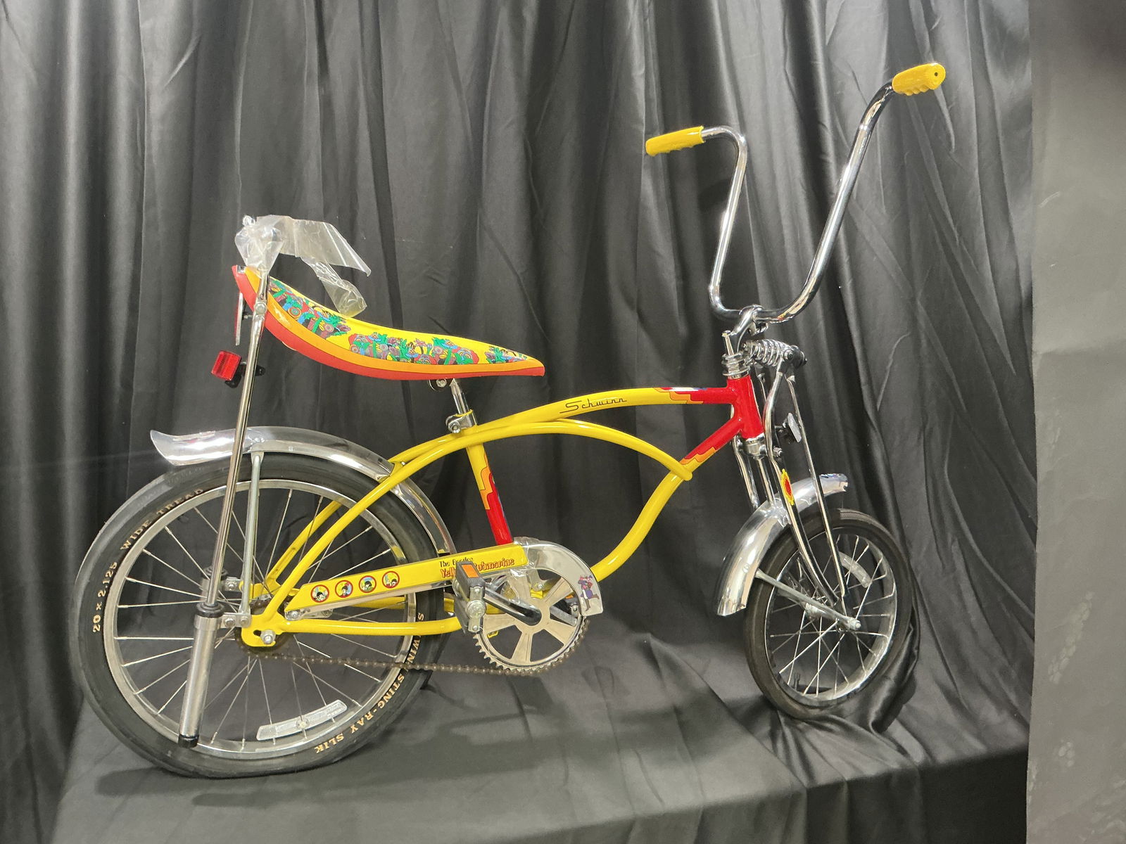 1999 Schwinn Sting-Ray "Yellow Submarine" Bicycle - Beatles Edition Psychedelic Banana: Rare and highly collectible Schwinn Sting-Ray bicycle produced in the celebrated "Yellow Submarine" theme inspired by the iconic 1968 Beatles animated film. Finished in bright yellow with red accents