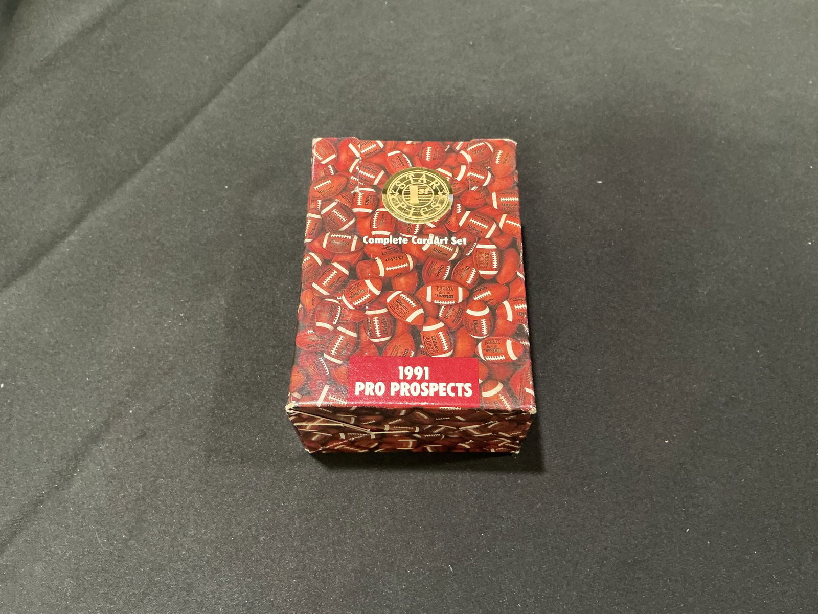 1991 Pro Prospects Complete Card Set Football Factory Set: 1991 Pro Prospects complete card set featuring football prospects and players from the early 1990s era. Factory set with themed football design packaging. Collector set with nostalgic appeal and poten