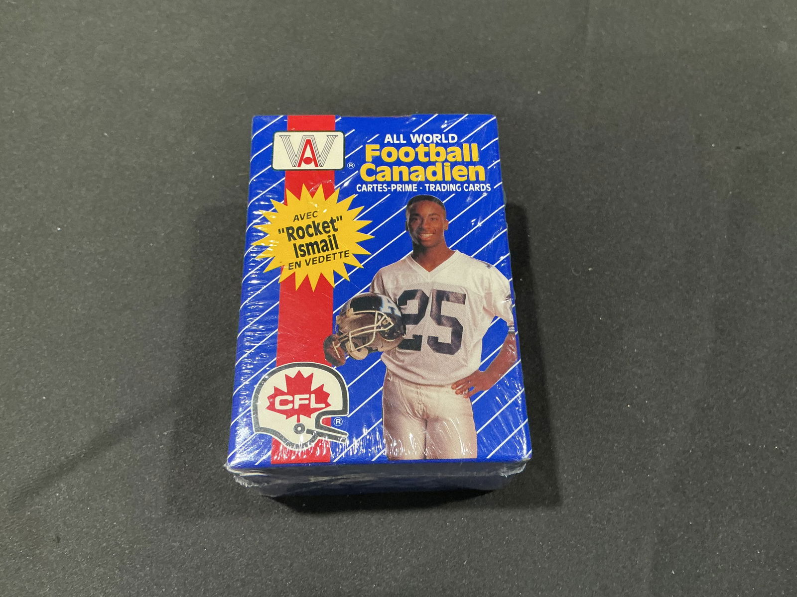 All World Football Canadien CFL Trading Cards Sealed Box Rocket Ismail: All World Football Canadien trading card box featuring CFL players and prominently highlighting Rocket Ismail. Factory sealed box with strong Canadian football appeal and collectible unopened status.