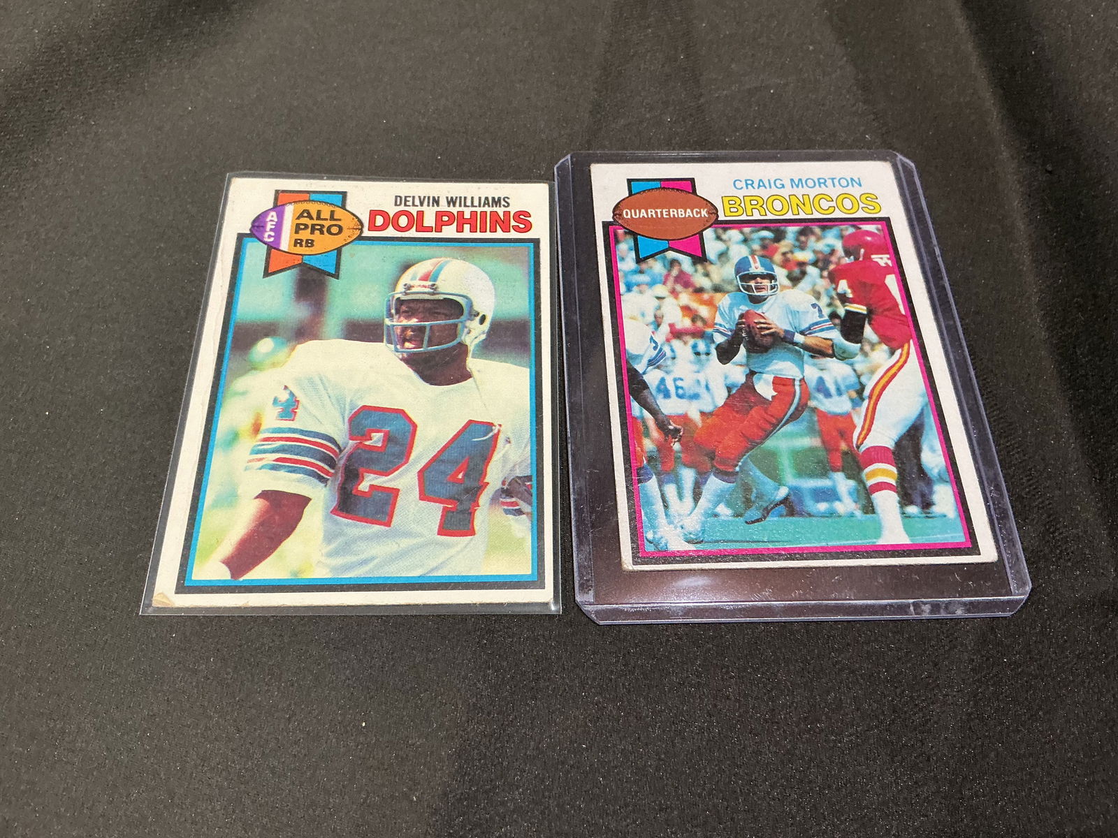 1979 Topps Delvin Williams Dolphins & Craig Morton Broncos Football Cards (2): Pair of 1979 Topps football cards featuring Delvin Williams of the Miami Dolphins and quarterback Craig Morton of the Denver Broncos. Classic late-1970s Topps issues with strong player representation.