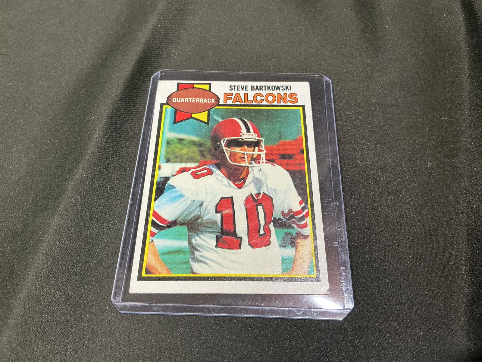 1979 Topps Steve Bartkowski Atlanta Falcons Football Card: 1979 Topps football card featuring quarterback Steve Bartkowski of the Atlanta Falcons. Classic late-1970s Topps design showcasing one of the Falcons' notable signal-callers of the era.