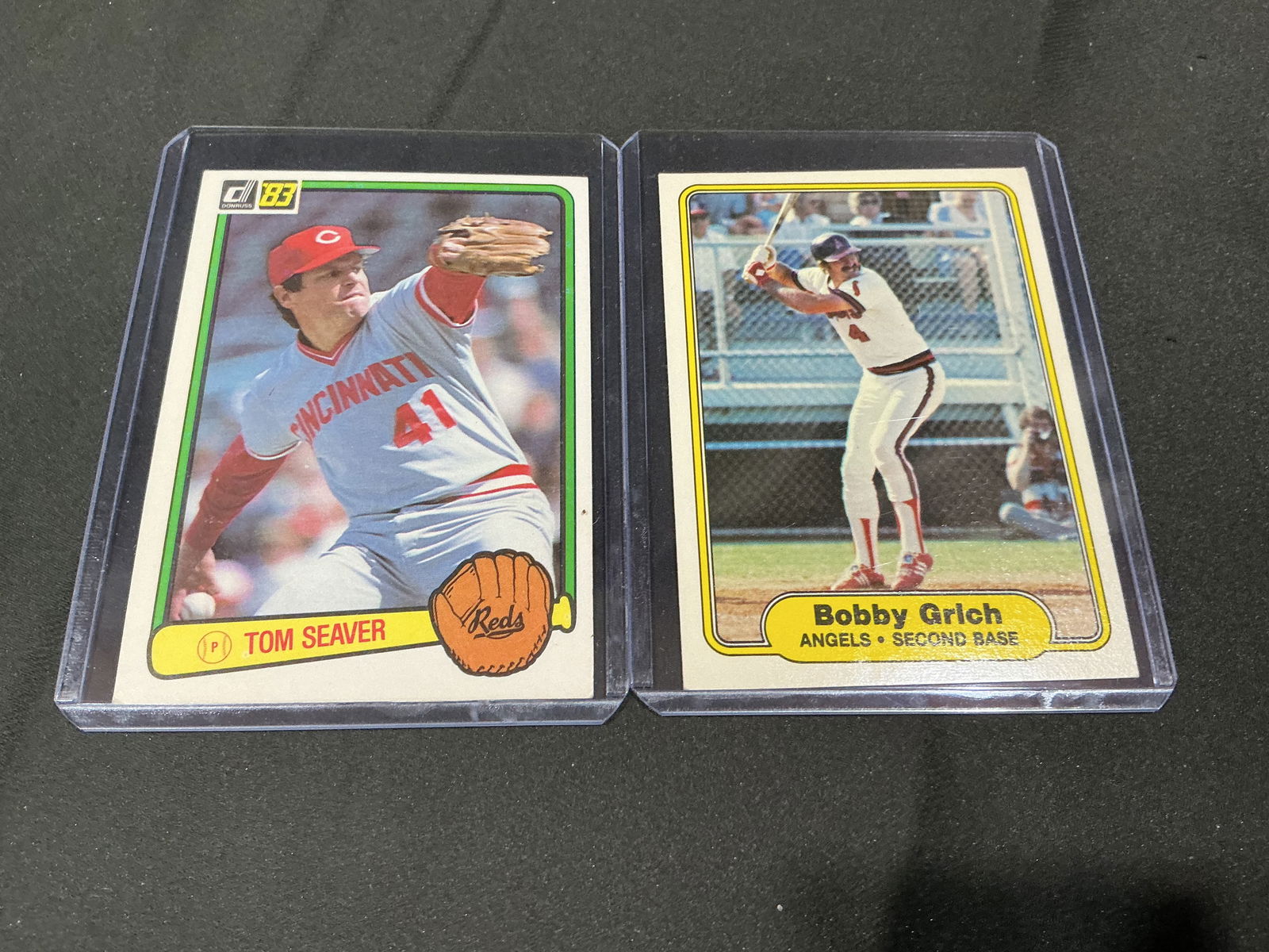 1983 Donruss Tom Seaver and 1982 Fleer Bobby Grich Baseball Cards (2): Pair of vintage baseball cards including 1983 Donruss Tom Seaver (Cincinnati Reds) and 1982 Fleer Bobby Grich (California Angels). Classic early-1980s designs with full statistics and player informati
