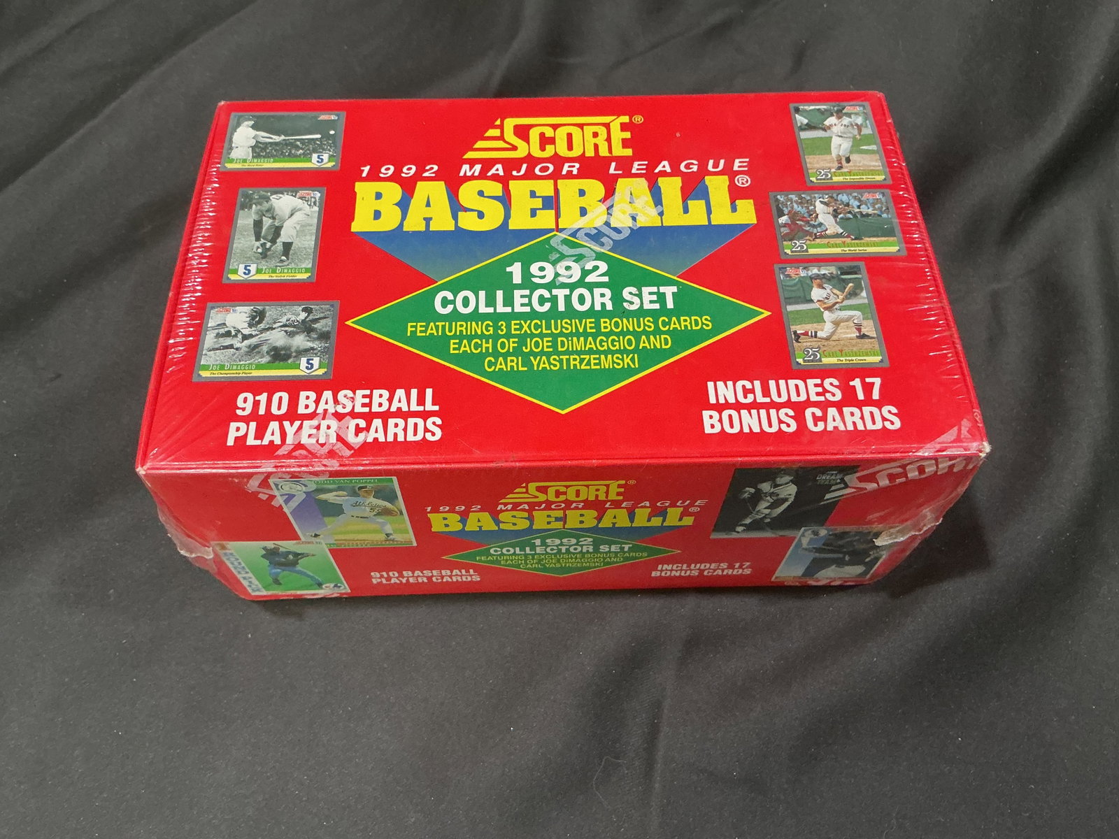 1992 Score Major League Baseball Complete Factory Set Sealed: 1992 Score Major League Baseball complete collector set factory sealed. Includes 910 cards plus 17 bonus cards featuring Joe DiMaggio and Carl Yastrzemski. Original shrink wrap with light wear.