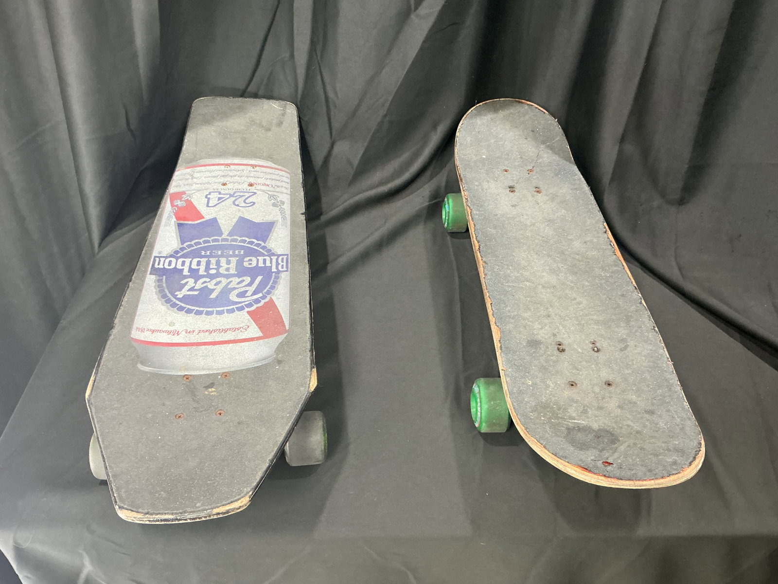 Vintage Pabst Blue Ribbon Cruiser & Epicenter Skateboard Pair: Two skateboard lot featuring a vintage-style Pabst Blue Ribbon themed cruiser board alongside an Epicenter skateboard with Dealer graphic deck and green wheels. Includes mixed street and cruiser style
