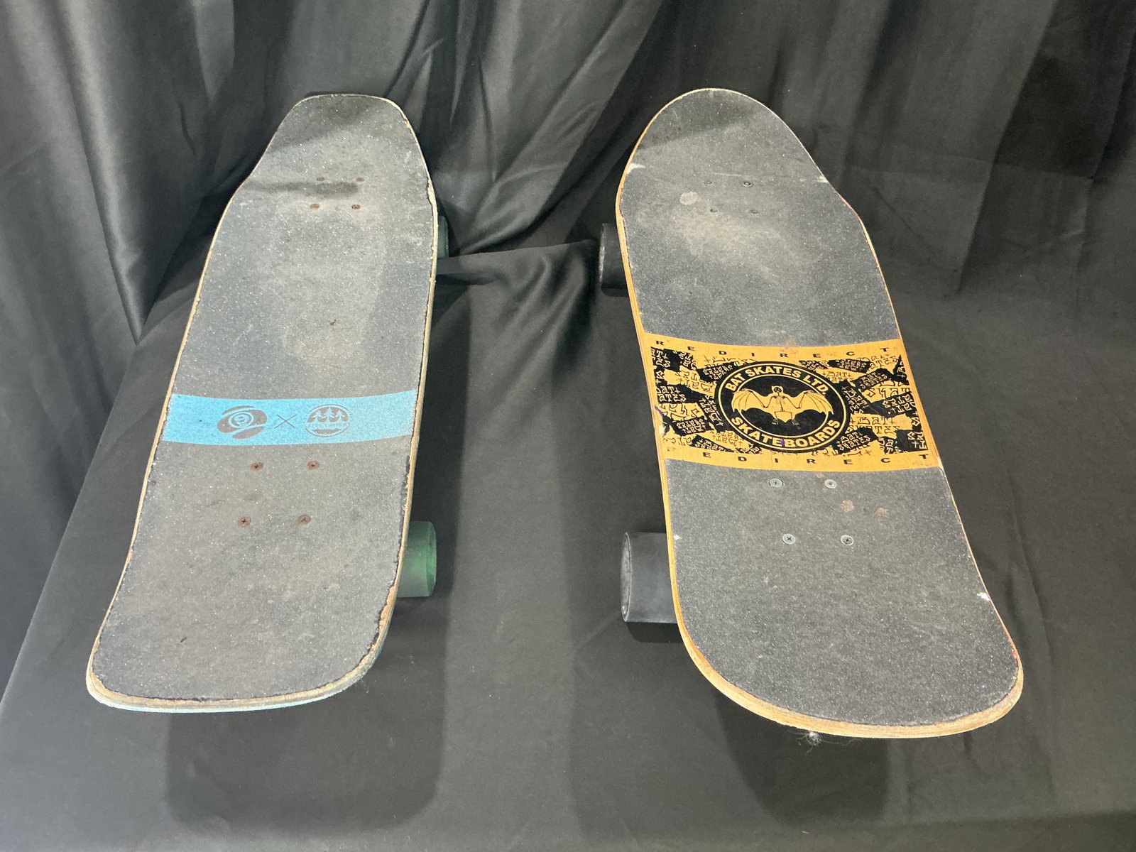 Dealer Felipe Skateboard & Graphic Skateboard Lot: Another chance offering of this two skateboard lot including a Dealer Felipe deck with green wheels and an additional graphic skateboard featuring bird and tower artwork. Includes trucks and wheels