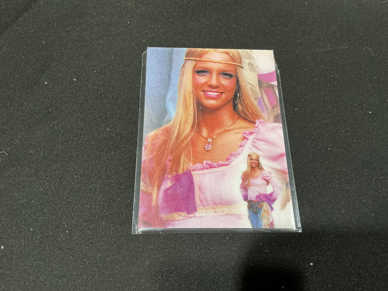 Britney Spears Certified Authentic Collectible Card: Britney Spears collectible card featuring portrait image and Global Authentication certificate reverse with authentication number BS203842. Includes Operation Swatch project tie-in and early 2000s pop