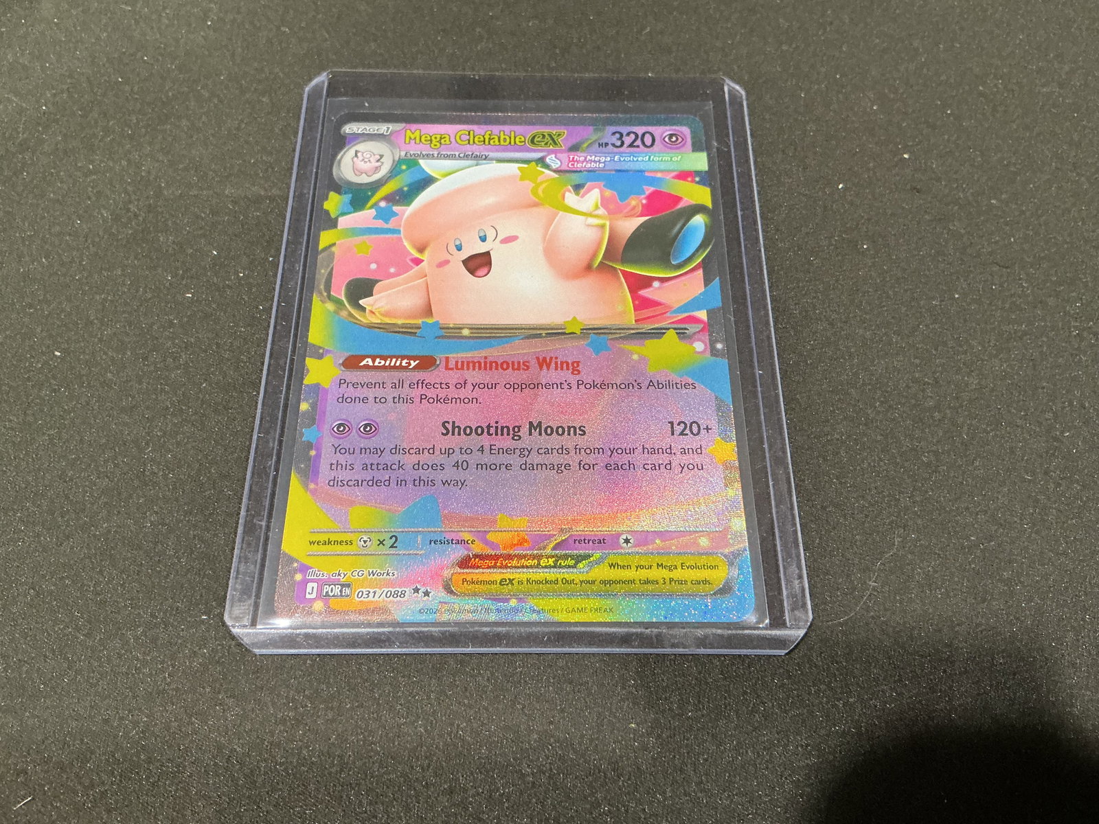 Pokemon Mega Clefable ex Full Art Card New Pull: Pokemon Mega Clefable ex full art card featuring bright pastel artwork and modern Mega Evolution styling. Freshly pulled and sleeved presentation with strong display appeal for Pokemon collectors and 