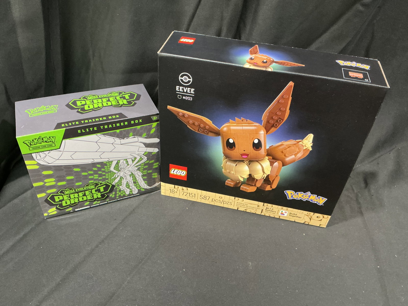 Pokemon ETB & LEGO Eevee Collector Lot Sealed Bonus Offering: Collector grouping featuring sealed Pokemon Mega Evolution Perfect Order Elite Trainer Box, Mega Evolution Ascended Heroes Elite Trainer Box, and LEGO Pokemon Eevee set 72151 with 587 pieces. Strong c