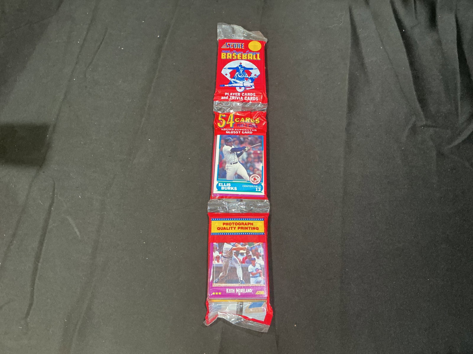 1990 Score Baseball Wax Rack Pack Ellis Burks Glossy Card: Vintage 1990 Score Baseball rack pack featuring Ellis Burks on the front with 54 cards plus bonus glossy card. Includes classic early 1990s MLB stars and rookies from the colorful Score baseball