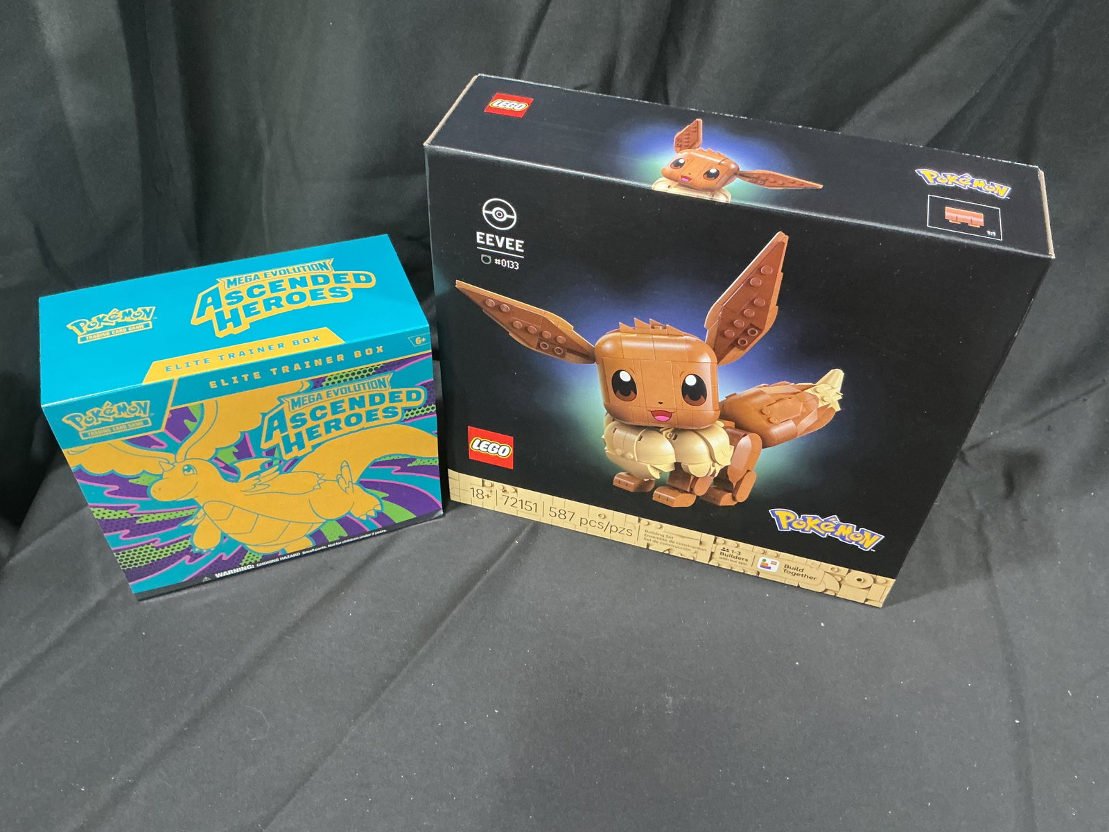 Pokemon Perfect Order ETB and LEGO Eevee 72151 Building Set: Pairing of Pokemon collectibles featuring a Mega Evolution Perfect Order Elite Trainer Box alongside LEGO Pokemon Eevee set 72151 with 587 pieces. Strong crossover appeal combining sealed Pokemon trad
