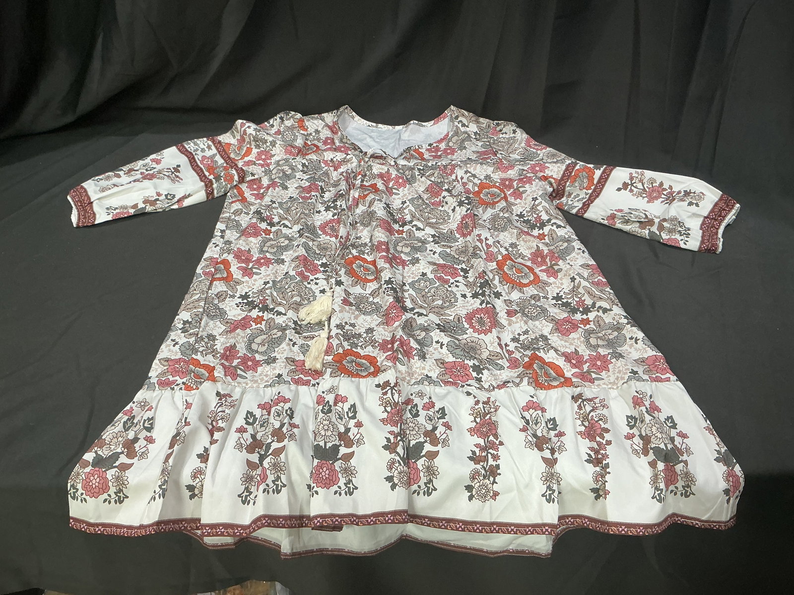 Women's Floral Boho Style Long Sleeve Dress XL: Women's floral patterned long sleeve dress featuring multicolor boho inspired print with tassel tie accents and flowing tiered design. Size XL polyester blend garment with soft lightweight feel.