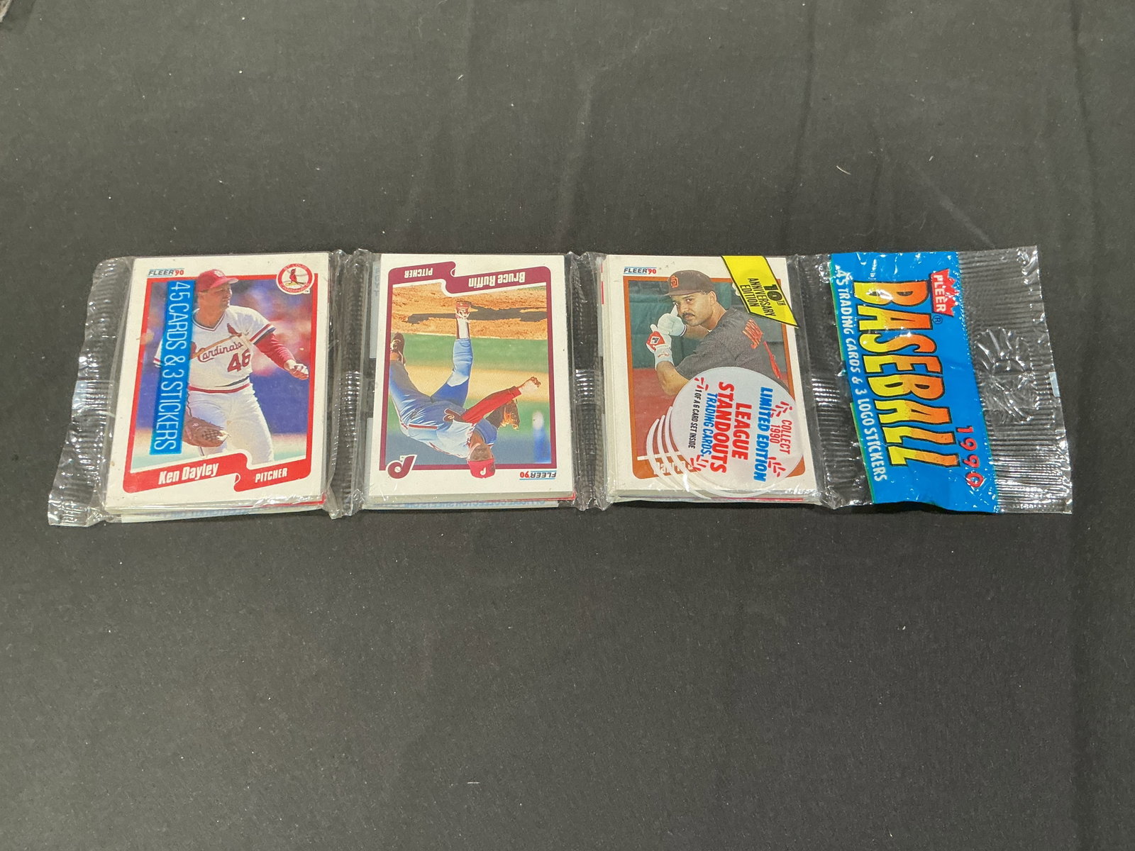 1990 Fleer Baseball Sealed Wax Pack Limited Edition Standouts ken deyley: Sealed 1990 Fleer baseball wax pack featuring 45 trading cards and 3 logo stickers. Limited Edition League Standouts wrapper with visible player cards and classic early 1990s baseball card