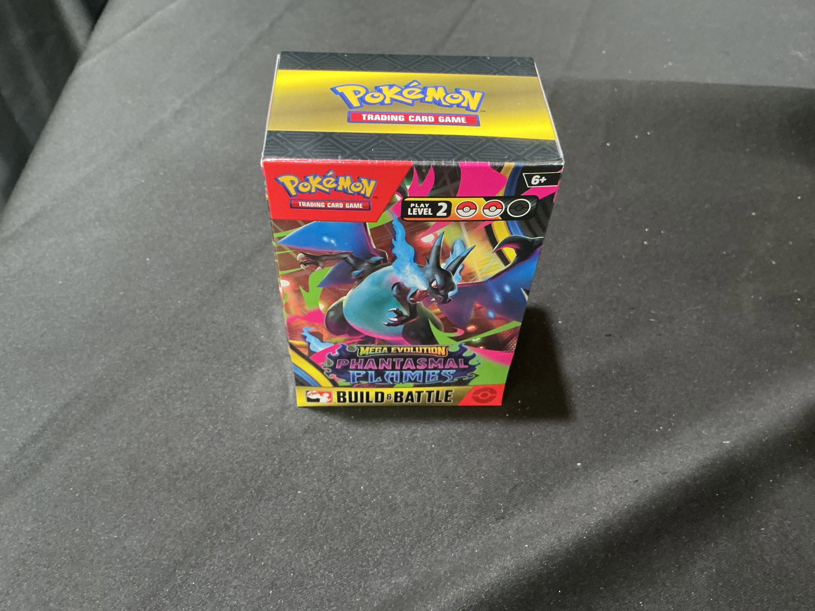 Pokemon Mega Evolution Phantasmal Flames Build & Battle Box Sealed Returning Collector Favorite: Factory sealed Pokemon TCG Mega Evolution Phantasmal Flames Build & Battle box featuring Charizard artwork from the modern Mega Evolution series. Includes a ready-to-play 40 card deck, four Mega