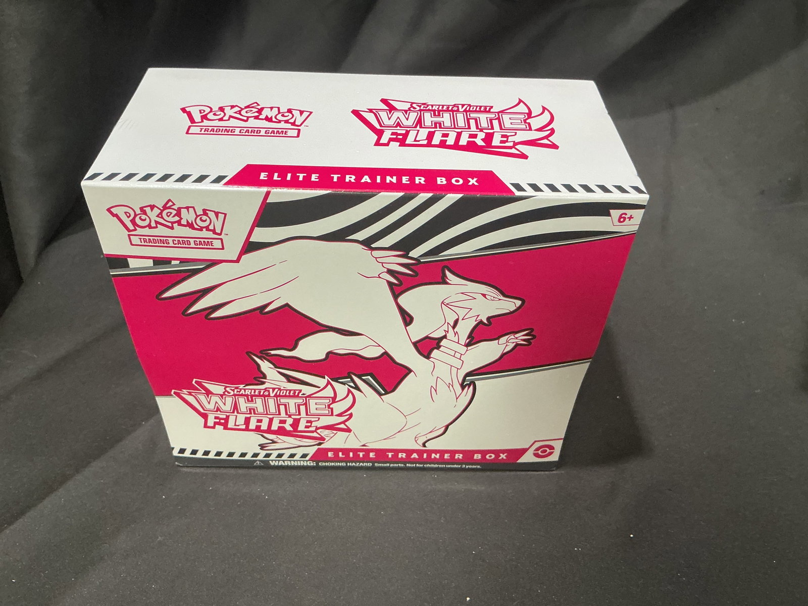 Pokemon Scarlet & Violet White Flare Elite Trainer Box Sealed Reshiram ETB: Factory sealed Pokemon Scarlet & Violet White Flare Elite Trainer Box featuring striking Reshiram artwork and themed accessories from the White Flare expansion. This collector-focused ETB includes