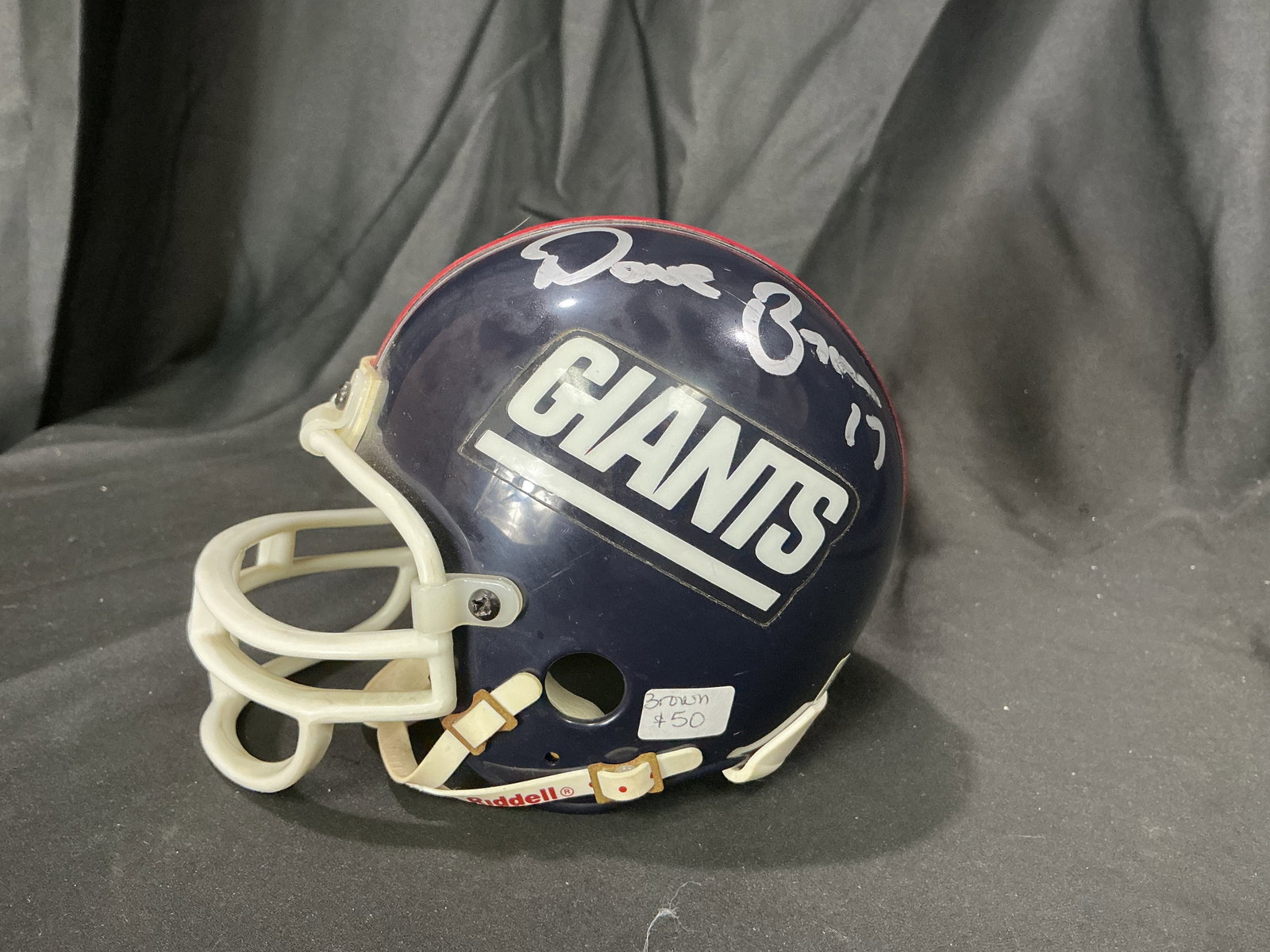 Dave Brown Signed New York Giants Mini Helmet: Autographed New York Giants mini helmet signed by former Giants quarterback Dave Brown with jersey number inscription. Compact display collectible featuring classic Giants team colors and strong
