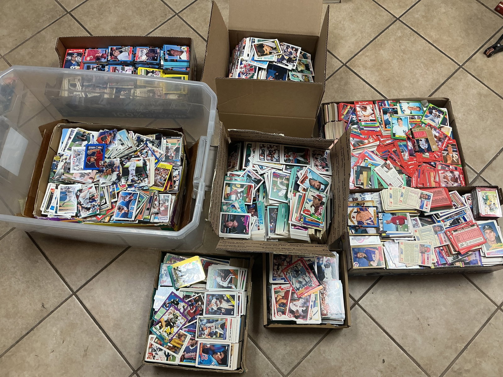 Vintage Sports Card Estate Lot Massive Mixed Collection Boxes: Large estate accumulation featuring thousands of vintage and modern sports trading cards spanning baseball, football, and hockey. Includes mixed brands and eras with visible Topps, Donruss, Fleer, Sco