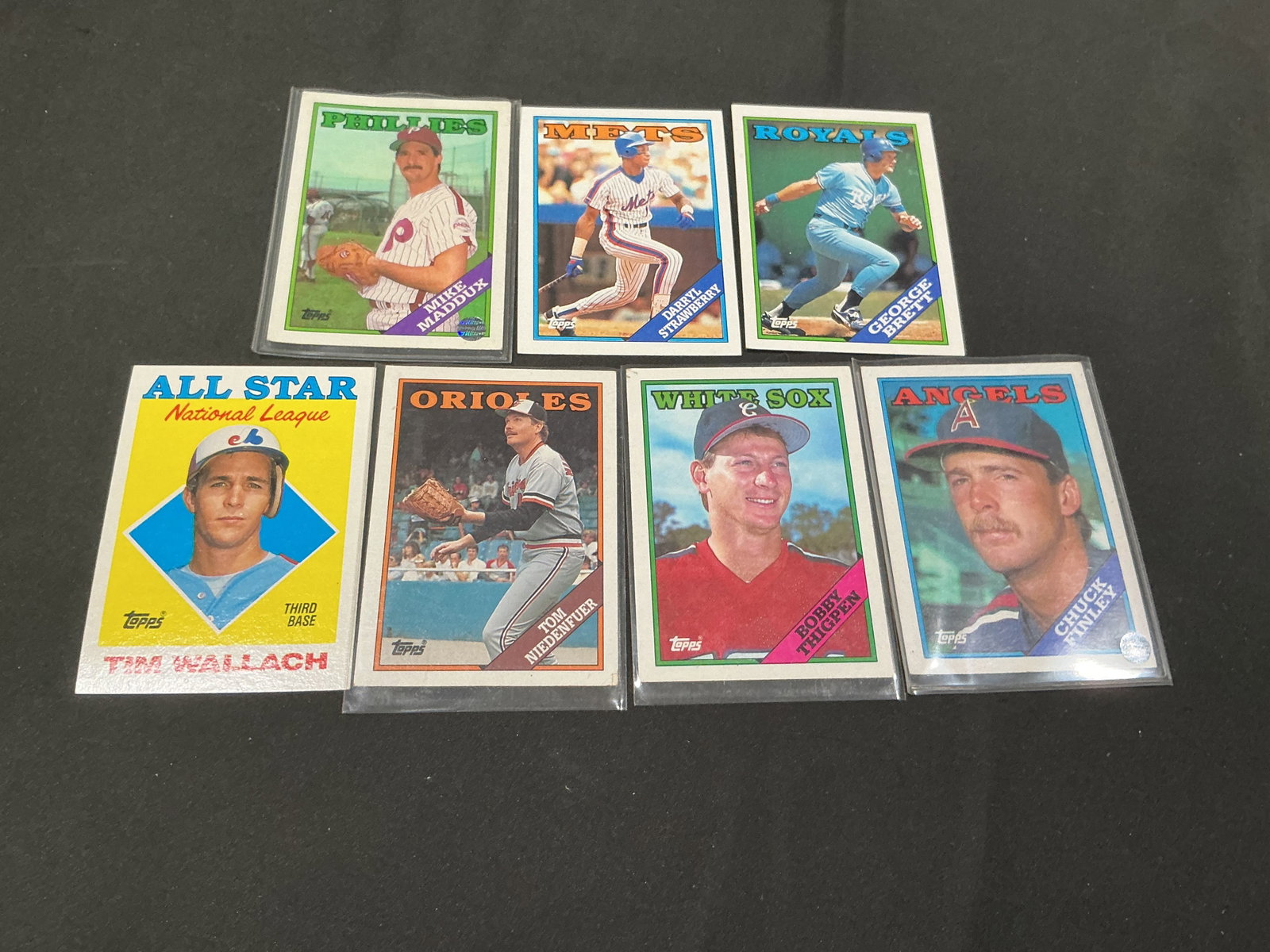 1988 Topps Baseball Star Card Lot Maddux Strawberry Brett Wallach: Returning offering from a prior auction appearance with recognizable baseball stars and vintage collector appeal. Group of 1988 Topps baseball cards featuring notable stars and veterans including