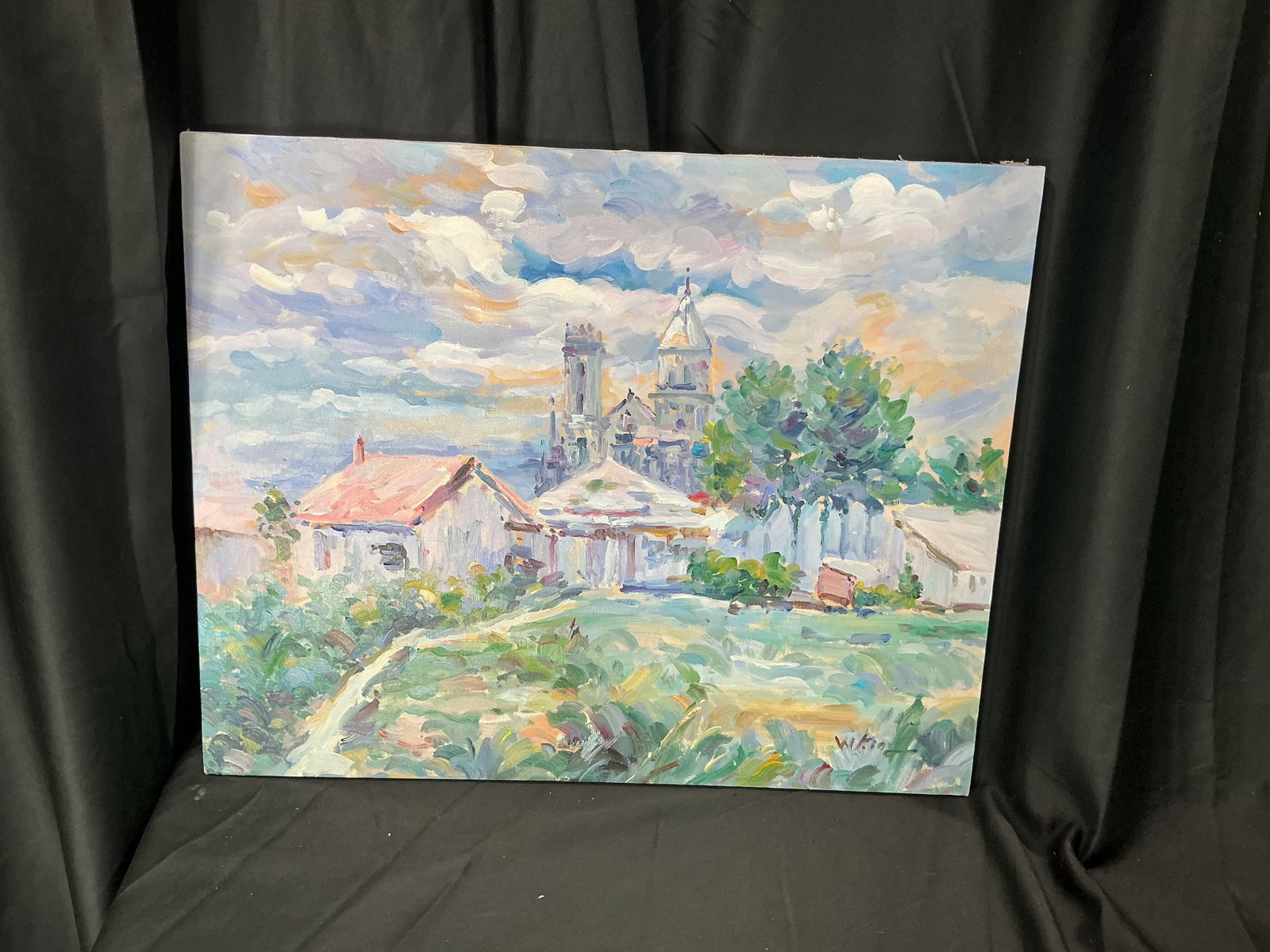 Vintage Impressionist Village Landscape Oil Painting Signed: Previously featured example returning to auction featuring an impressionist-style village landscape oil painting showing countryside homes beneath dramatic cloud-filled skies with church architecture