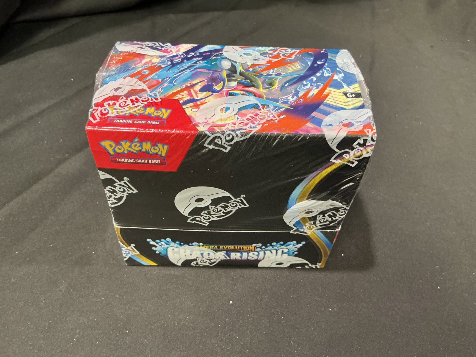Pokemon Mega Evolution Chaos Rising Elite Trainer Box Sealed: Back once more after an earlier appearance in this same auction, this factory sealed Pokemon Mega Evolution Chaos Rising Elite Trainer Box features dynamic modern artwork and strong sealed Pokemon