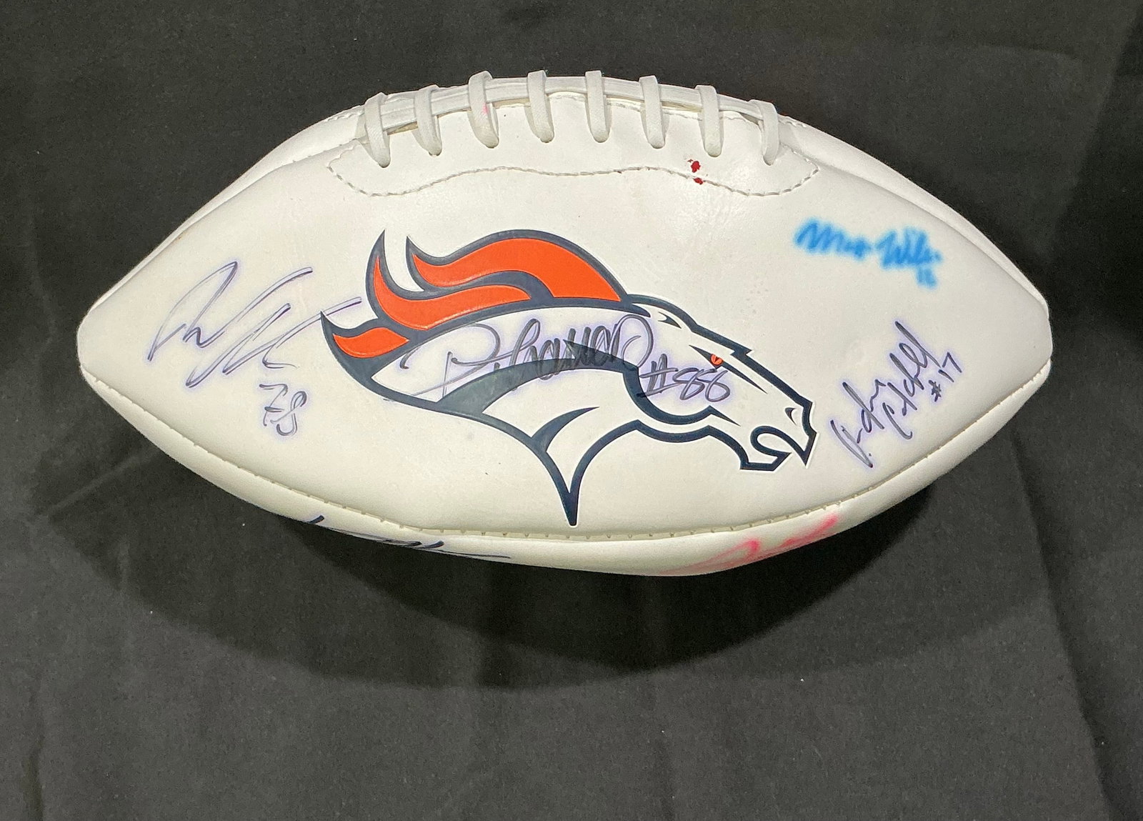 Denver Broncos Multi Signed Football Von Miller Demaryius Thomas: Returning after a long absence from our auction lineup, this official NFL licensed Denver Broncos white panel football is autographed by multiple team members circa 2010 to 2014. Visible signatures in