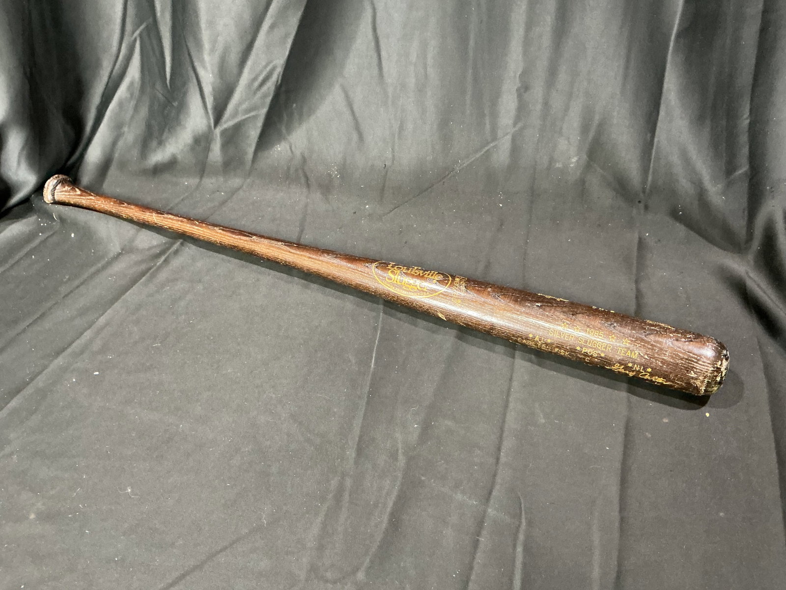 1985 Silver Slugger Team Louisville Slugger Commemorative Baseball Bat: Louisville Slugger commemorative baseball bat honoring the 1985 Silver Slugger Team. Features facsimile signatures and player names from the award-winning lineup including notable stars of the era.