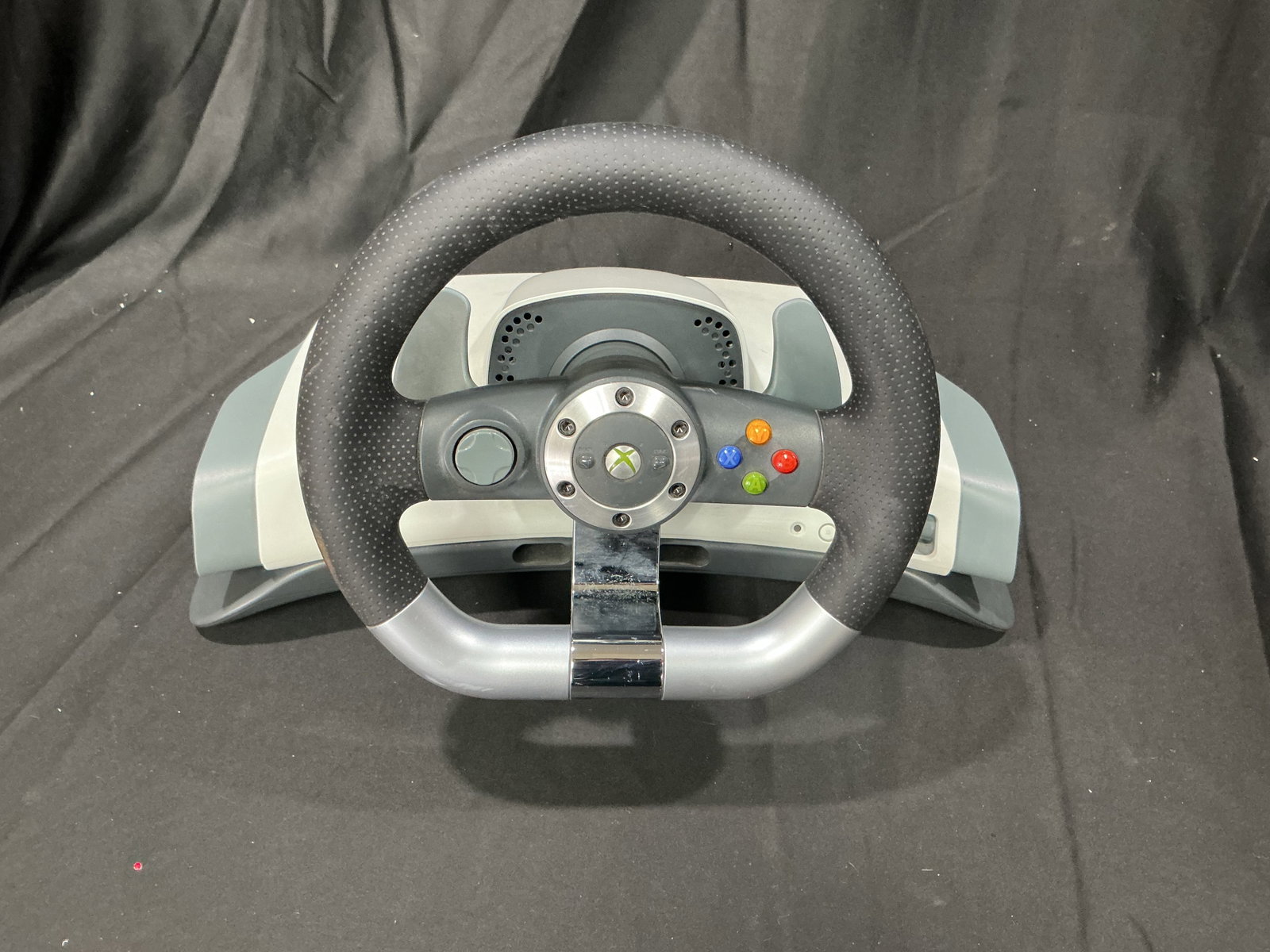 Xbox 360 Wireless Racing Wheel Controller: Microsoft Xbox 360 Wireless Racing Wheel with force feedback. Features steering wheel controls, paddle shifters, and integrated base. Compatible with Xbox 360 racing titles and sought after by retro