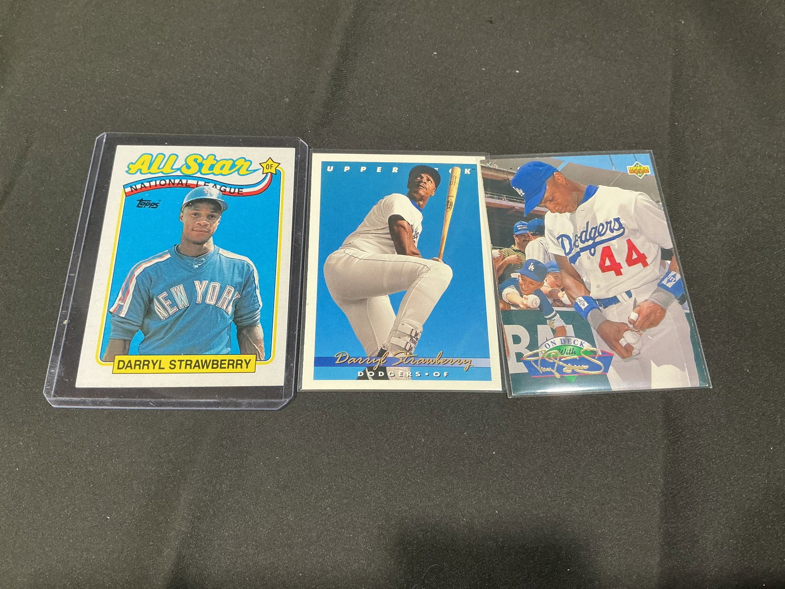 Darryl Strawberry Star Card Collection Lot: Collection of vintage Darryl Strawberry baseball cards including Topps All-Star issue and Upper Deck Dodgers examples. Features cards spanning Strawberry's standout Major League career with strong