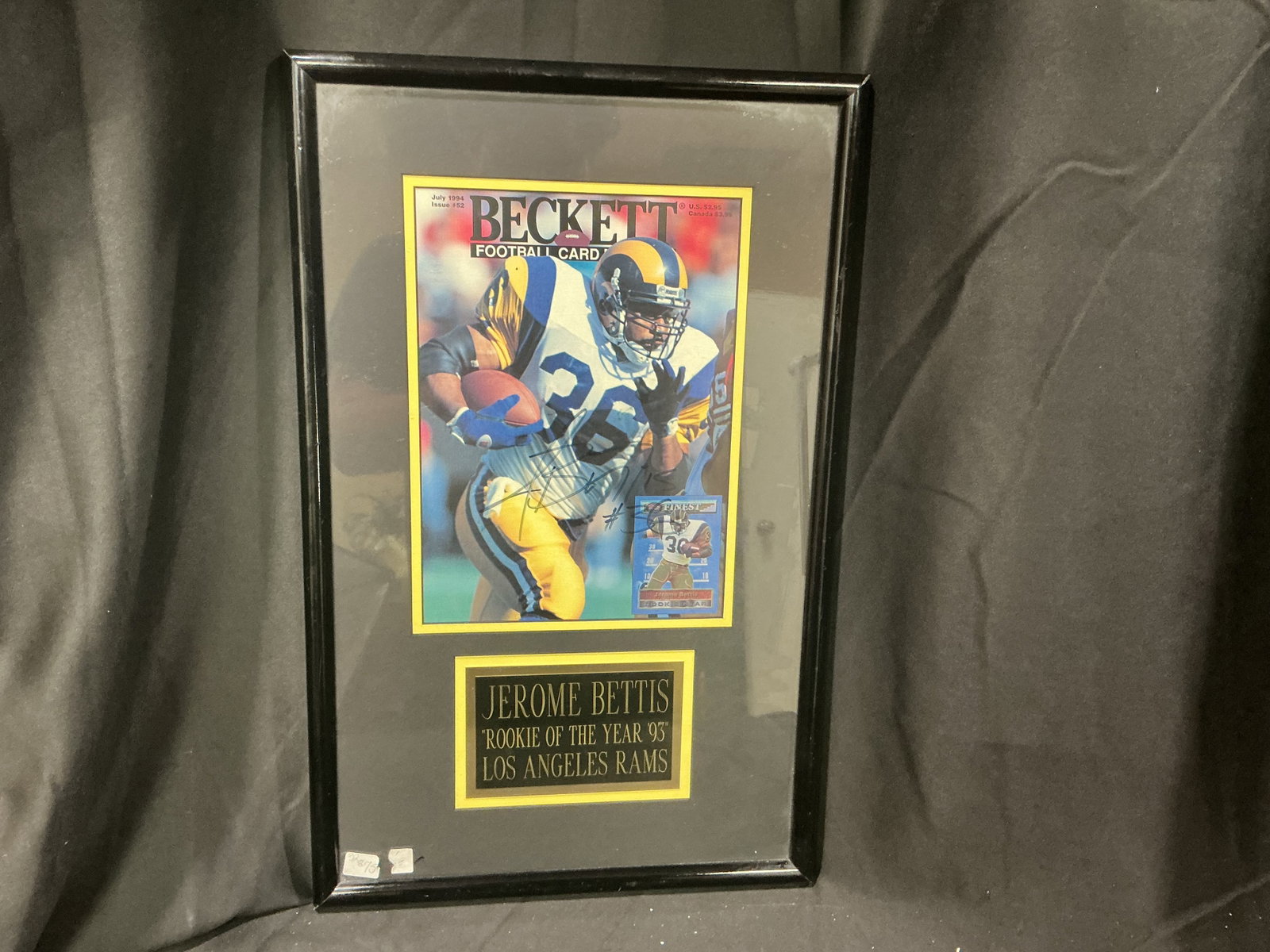 Jerome Bettis Signed ROY Beckett Cover Framed: Full-size July 1994 Beckett Football Card Monthly magazine cover featuring Jerome Bettis as Rookie of the Year 1993 with the Los Angeles Rams. Boldly signed across the front by 'The Bus' and