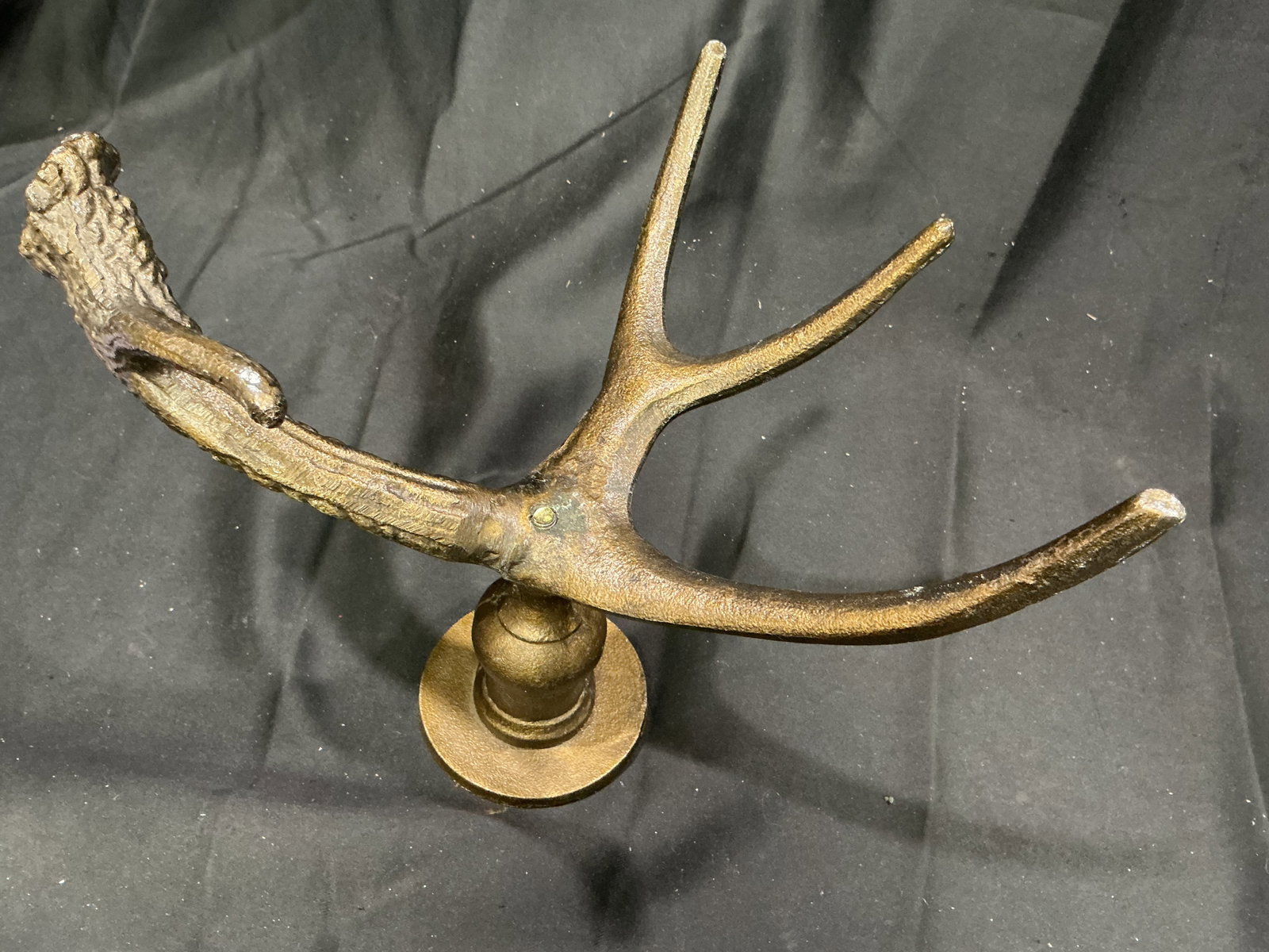 Cast Metal Deer Antler Display Stand: Decorative cast metal deer antler form display stand. Rustic lodge-style accent piece suitable for displaying jewelry, watches, keys, or small collectibles. Estimated shipping $8-$15.