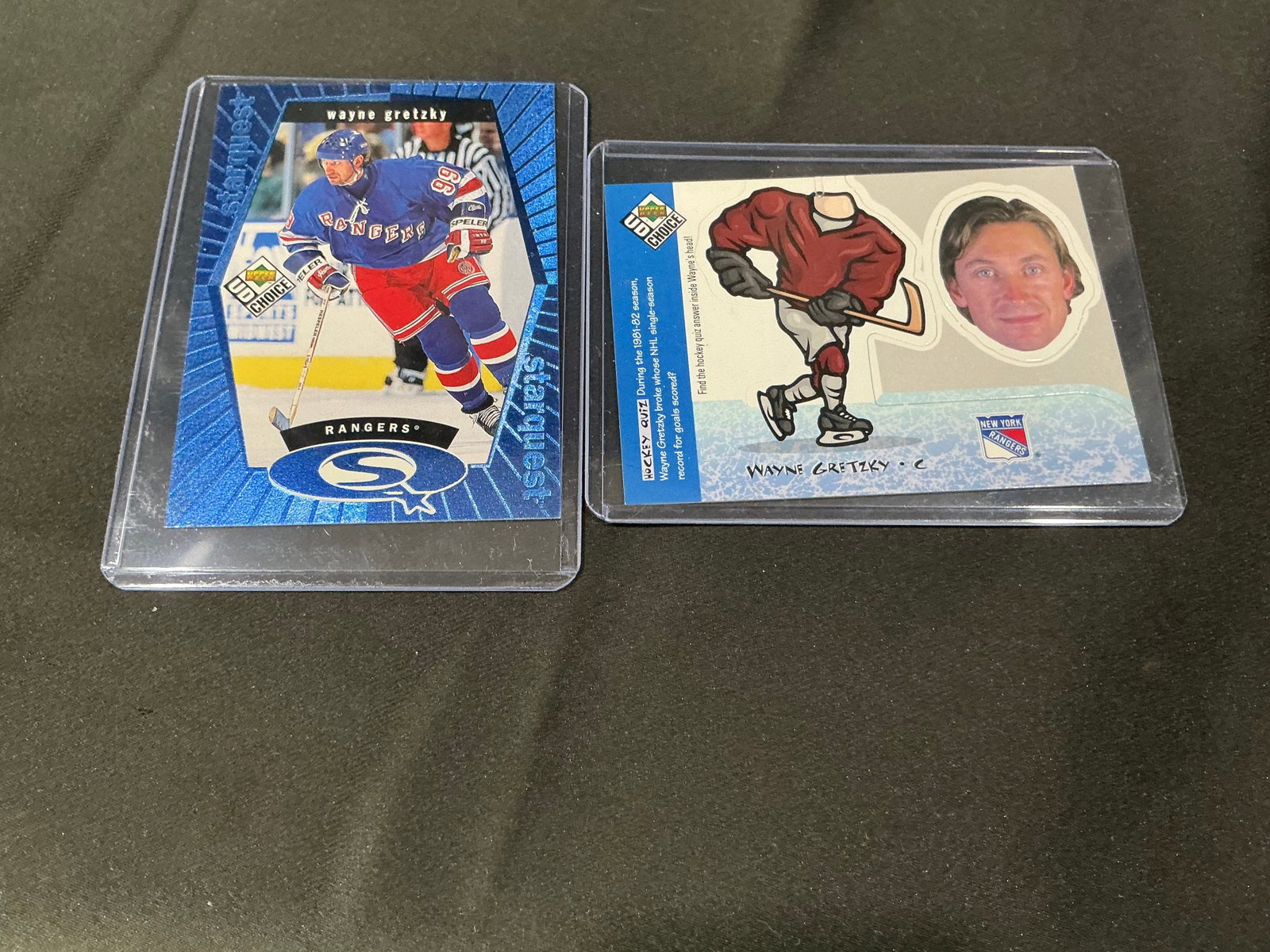 Wayne Gretzky Rangers Card Pair: Wayne Gretzky New York Rangers card pair including special insert and interactive character-style issue. Hall of Fame NHL legend and longtime collector favorite. Estimated shipping $5-$10.