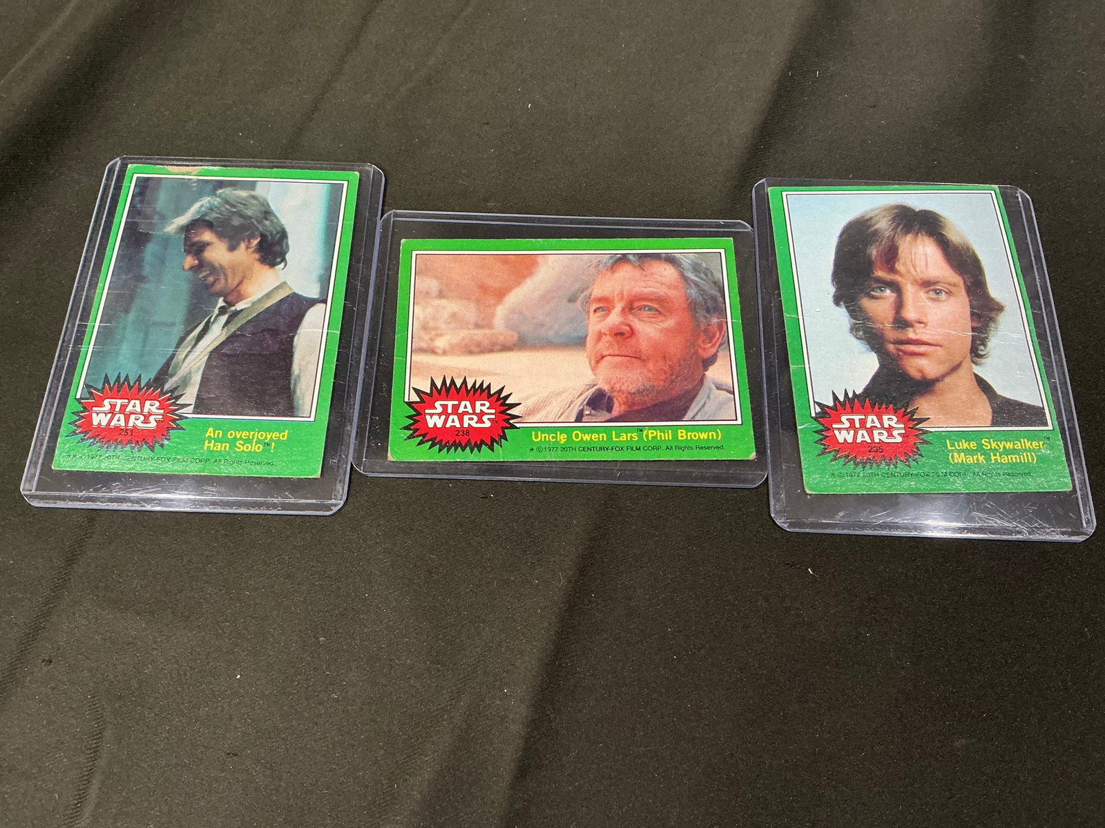 Star Wars Green Series Luke Han Owen Cards: Three-card Star Wars green series character lot featuring Luke Skywalker, Han Solo, and Uncle Owen Lars. Includes key original trilogy characters with strong appeal for Star Wars collectors, vintage t