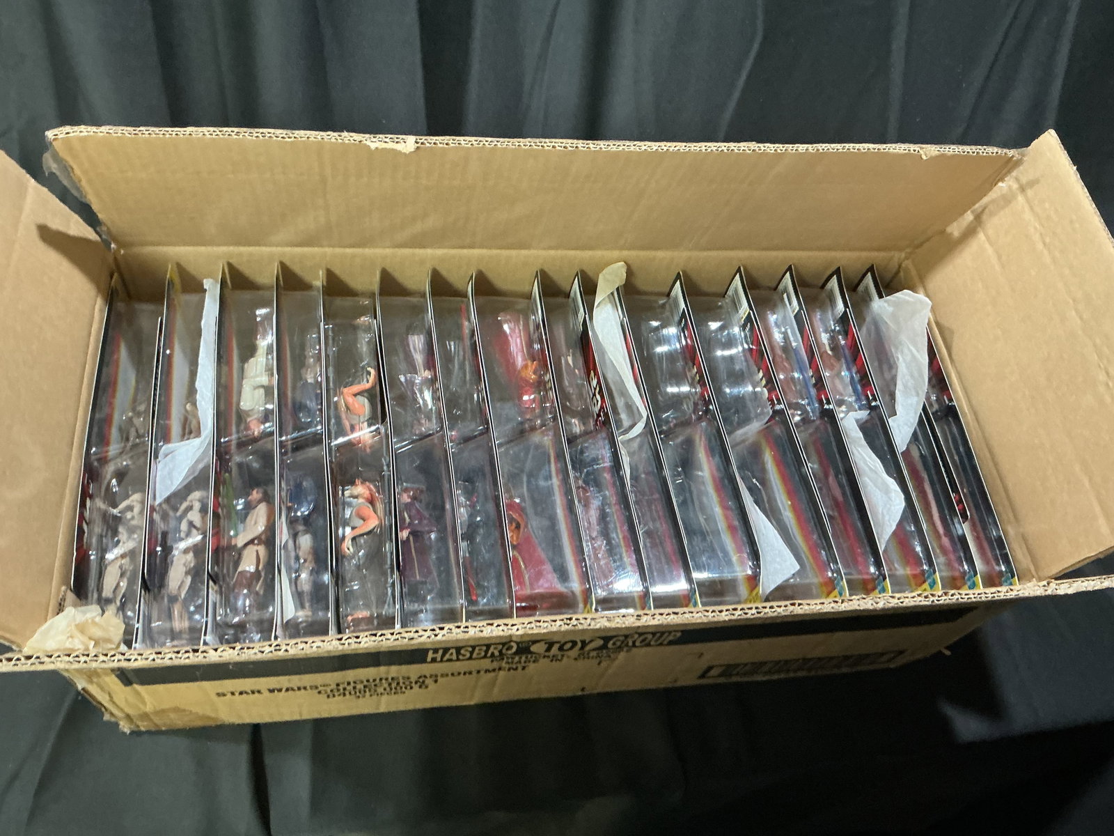 Star Wars Episode I Hasbro Case 32 Figures: Returning Star Wars Episode I Hasbro Toy Group case lot containing approximately 32 carded figures from Collection 1. Includes assorted Phantom Menace figures with strong shelf presence and dealer, re
