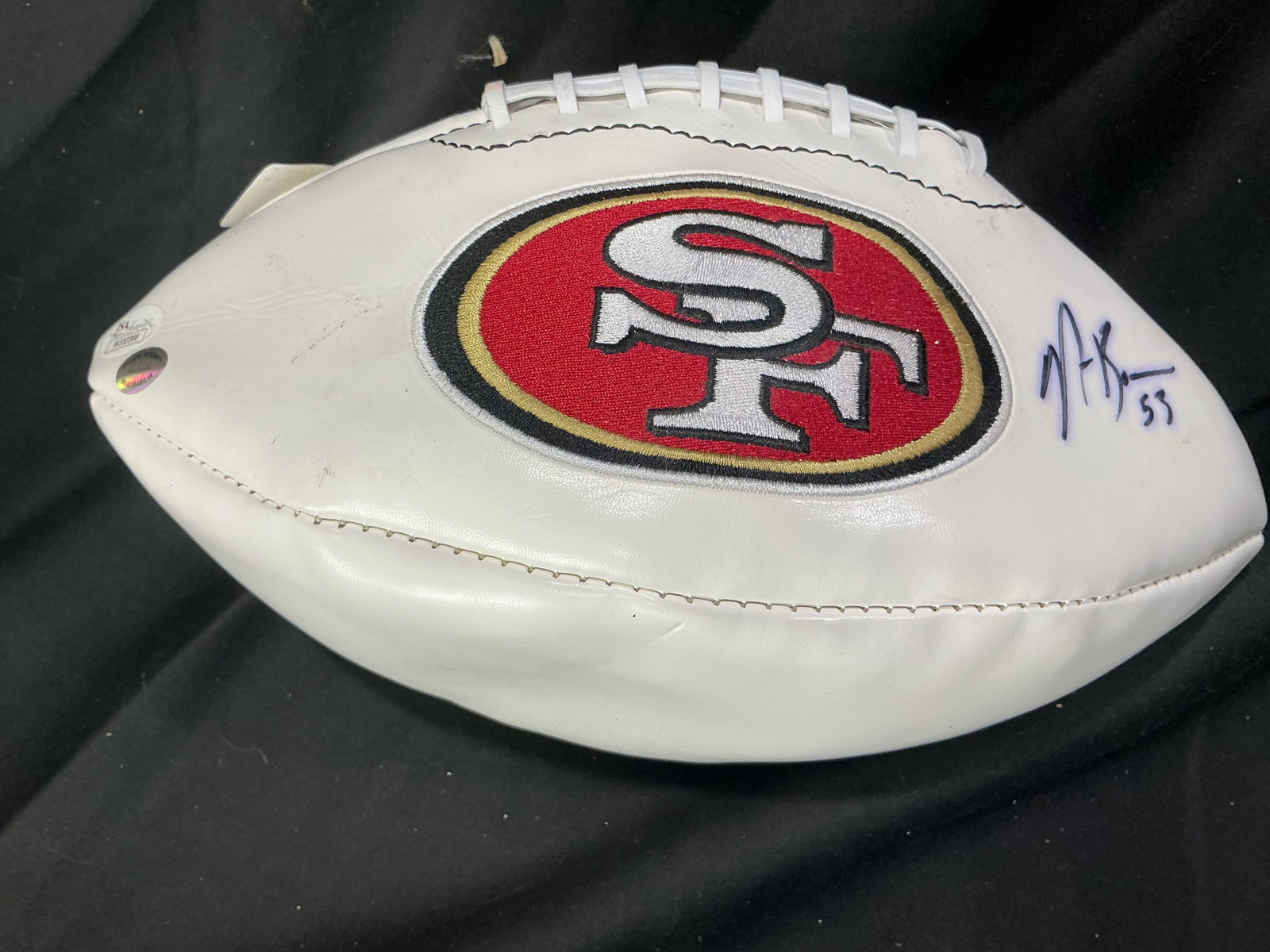 Fred Kelly Signed 49ers Commemorative Football: San Francisco 49ers commemorative football featuring team history graphics and an autograph attributed to Ken Riley as shown. Includes hologram authentication sticker. Estimated shipping $18-$30.
