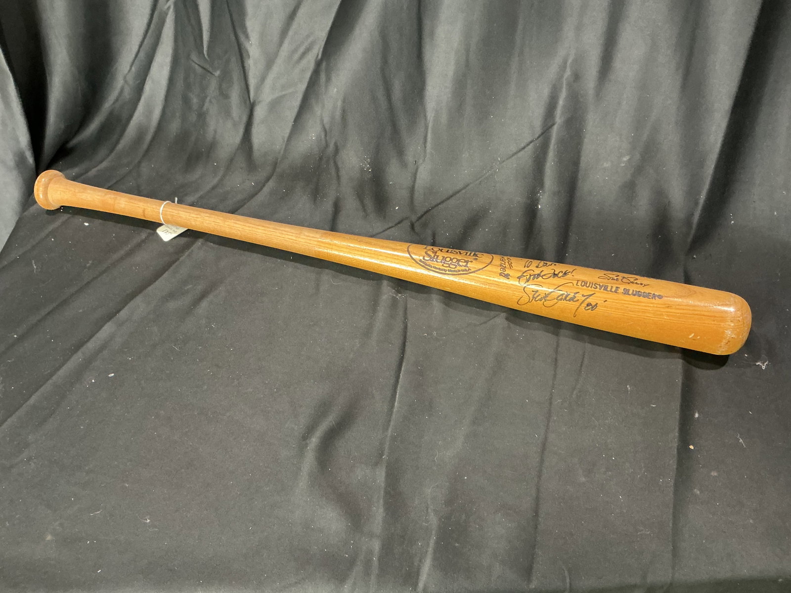 Steve Garvey Signed Louisville Slugger Bat: Louisville Slugger baseball bat hand-signed by MLB All-Star and Los Angeles Dodgers legend Steve Garvey. Attractive display piece for baseball memorabilia collectors. Tag notes signature was not