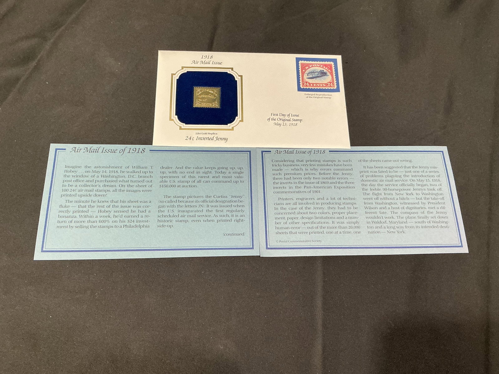Inverted Jenny Gold Stamp Replica: Commemorative 22kt gold replica honoring the famous 1918 24 cent Inverted Jenny Air Mail stamp error. Includes informational display cards detailing the history of one of the most recognizable and