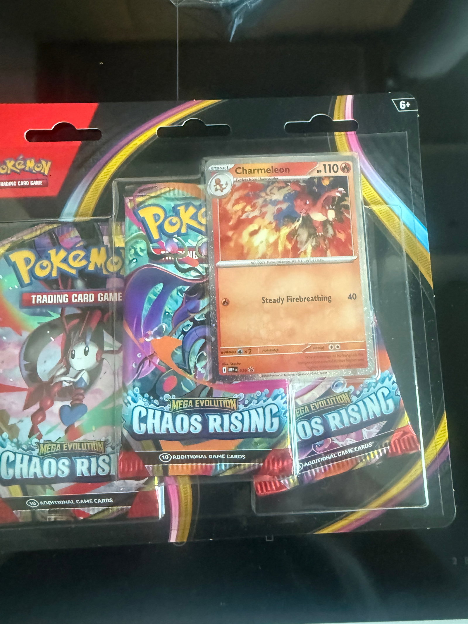 Chaos Rising 3-Pack Blister: Returning for another round, this factory sealed Pokemon Mega Evolution Chaos Rising three-pack blister includes a Charmeleon promo card and three Chaos Rising booster packs. Accessible sealed