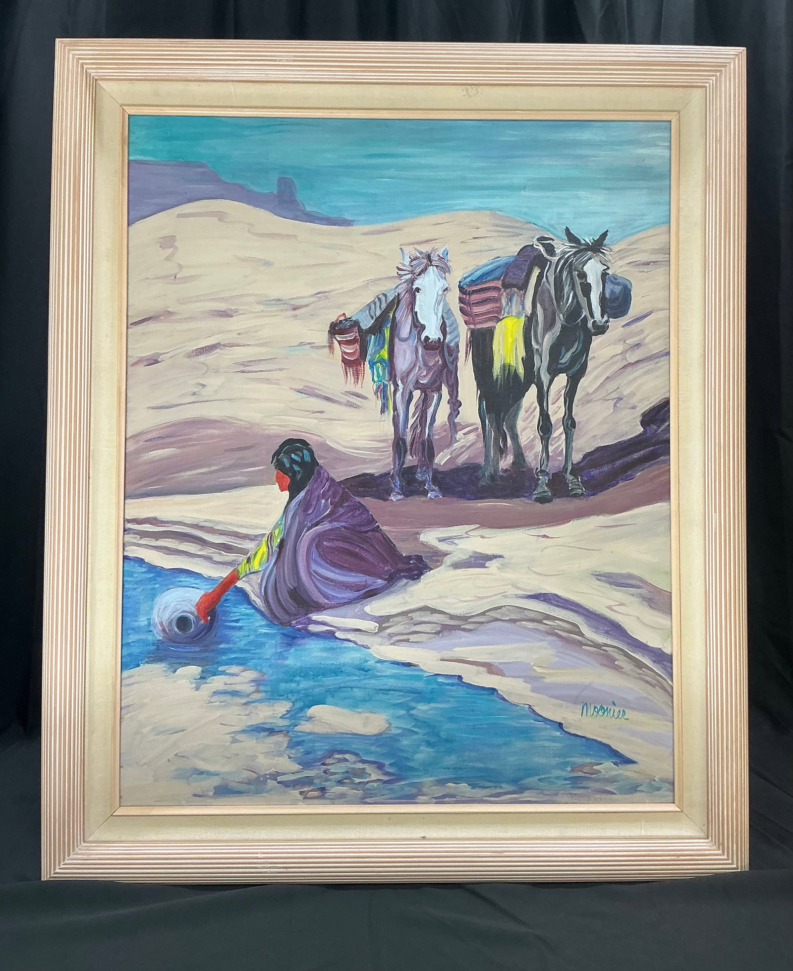 Southwestern Desert Woman Oil Painting: Signed oil on canvas depicting a Southwestern desert scene with a woman gathering water beside a stream while two saddled horses wait nearby against a backdrop of sand dunes and distant mesas.