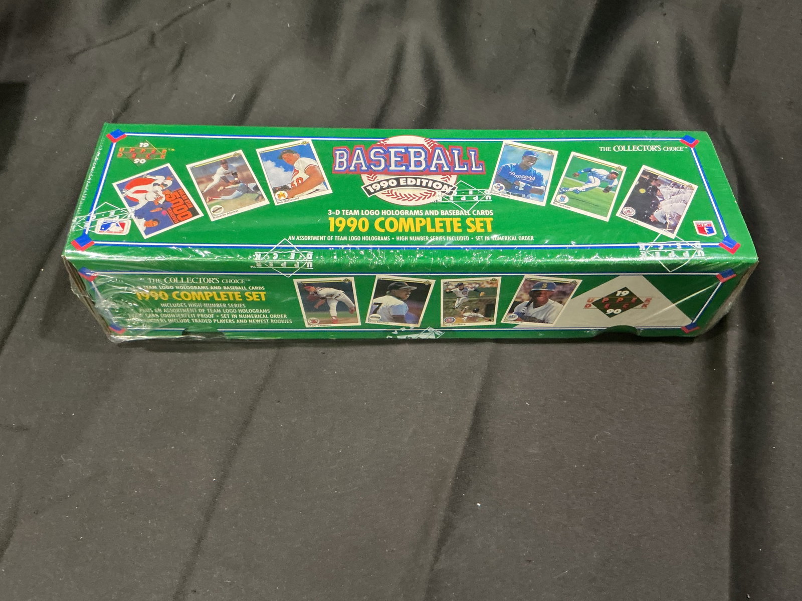 1990 Upper Deck Baseball Complete Set: Factory sealed 1990 Upper Deck Baseball Complete Set including the full factory set with 3-D team logo holograms. A classic Upper Deck release featuring high-quality production and broad appeal for vi